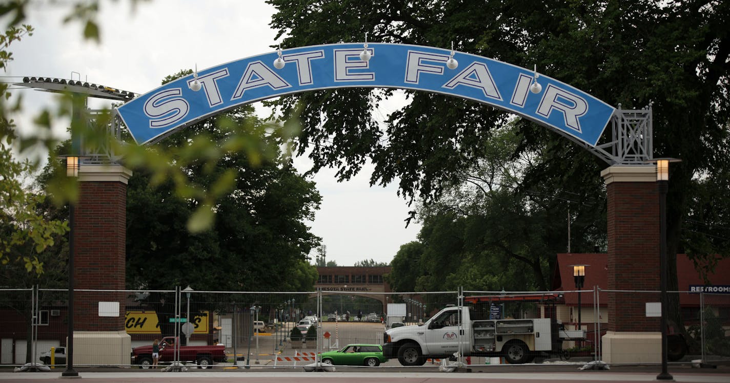 This restored blue archway sign at the Minnesota State Fairgrounds dates from the 1930s and stands in the West End Market, where Heritage Square once stood.] MONICA HERNDON monica.herndon@startribune.com Falcon Heights, MN 07/18/14