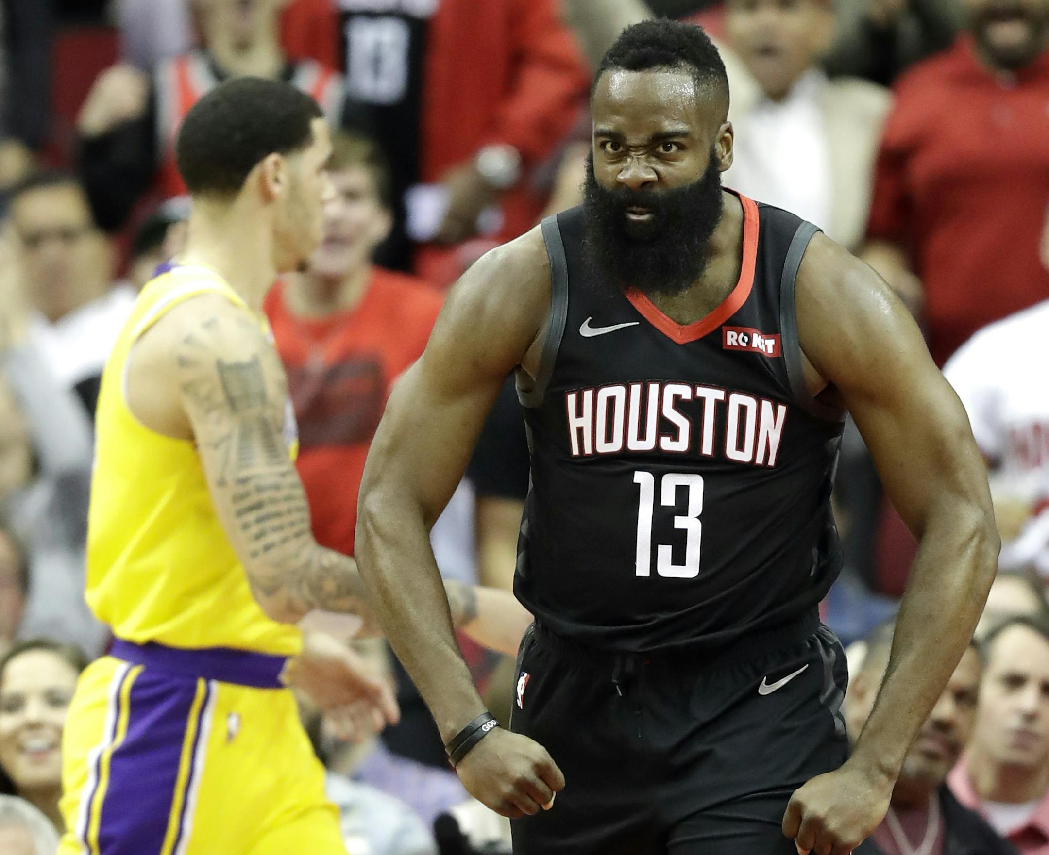 Houston Rockets' James Harden (13) reacts after dunking the ball against the Los Angeles Lakers during the first half of an NBA basketball game Thursday, Dec. 13, 2018, in Houston. (AP Photo/David J. Phillip)