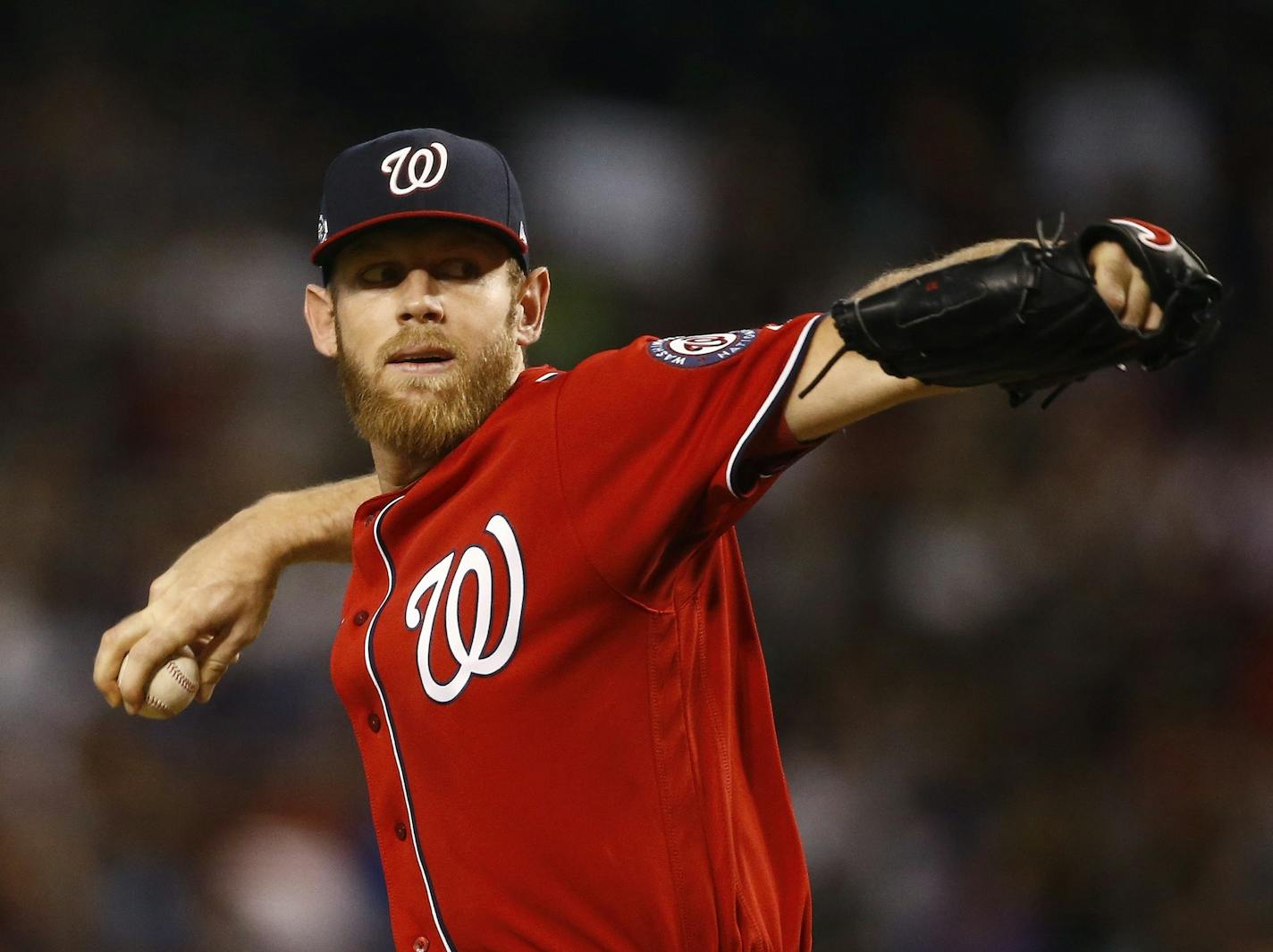 Washington Nationals starting pitcher Stephen Strasburg throws a pitch against the Arizona Diamondbacks during the first inning of a baseball game Saturday, May 12, 2018, in Phoenix. (AP Photo/Ross D. Franklin)