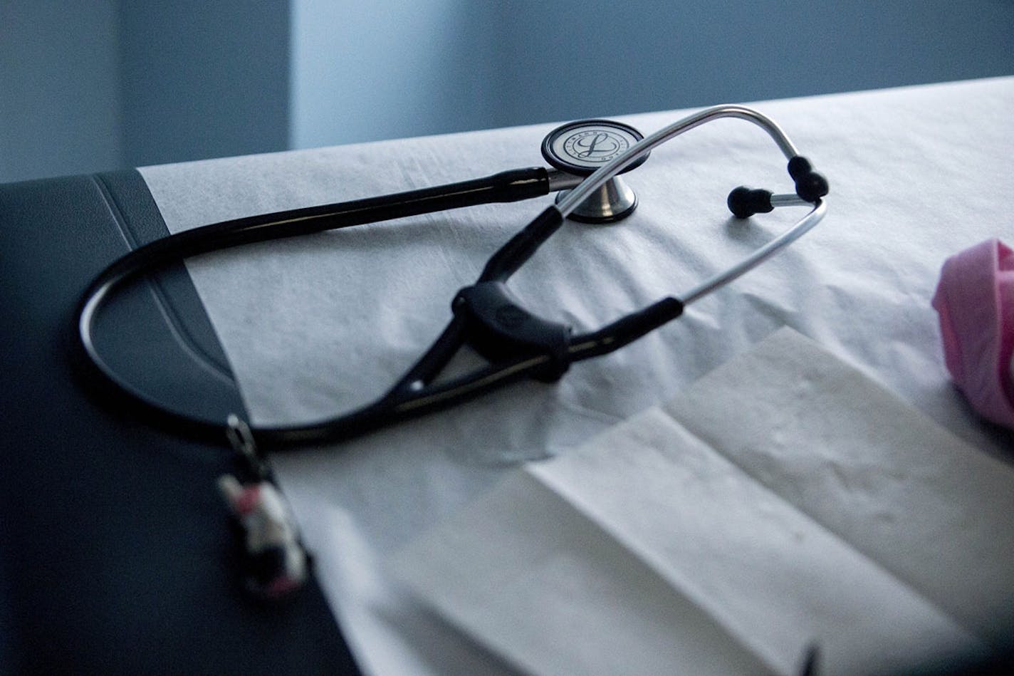 A stethoscope sits on an examination table in an exam room at a Community Clinic health center in Takoma Park, Md. MUST CREDIT: Bloomberg photo by Andrew Harrer ORG XMIT: 547405277