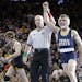 Penn State's Zain Retherford, is declared the winner over Iowa's Brandon Sorenson in the 149-pound championship match of the NCAA Division I Wrestling