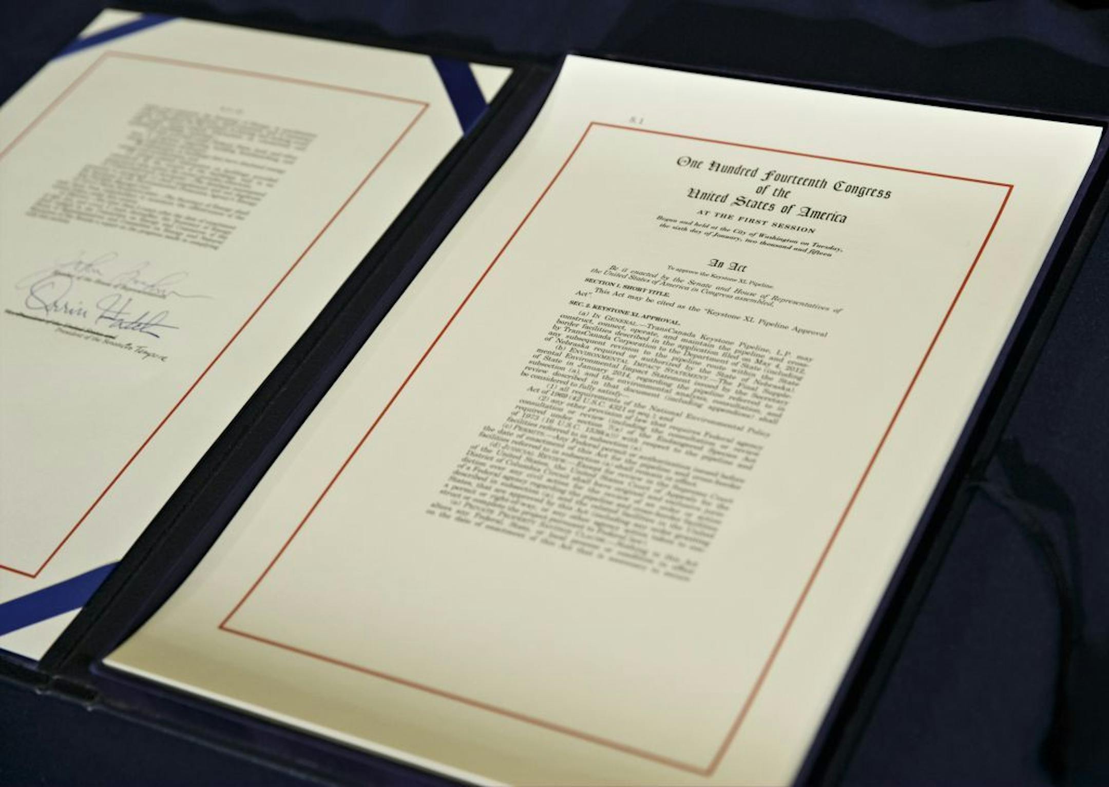 The Keystone XL Pipeline Approval Act is seen after being signed by Speaker of the House John Boehner, R-Ohio, and which allows expansion of the pipeline to carry oil from Canada to Gulf Coast refineries in the U.S., at the Capitol in Washington, Friday, Feb. 13, 2015. Though passage of the long-stalled legislation was a Republican campaign promise during the midterm elections last year, President Barack Obama has promised to veto the act.
