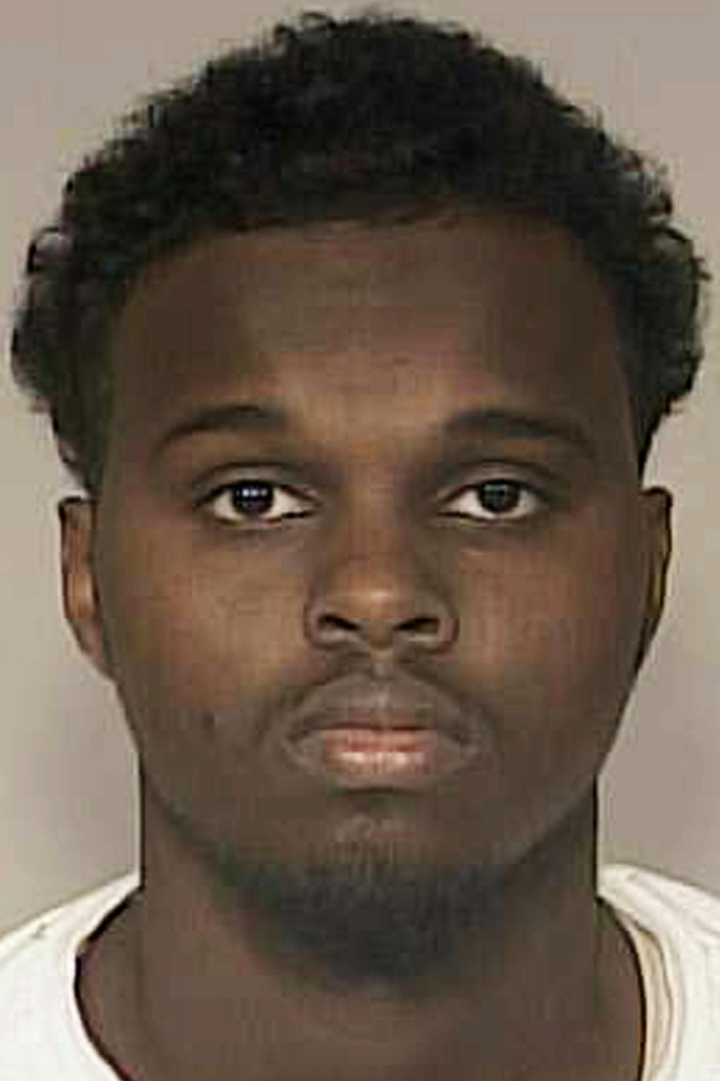 This photo provided by the Anoka County, Minnesota, Sheriff shows Abdirizak Mohamed Warsame, 20, of Eagan, Minnesota. Warsame was charged Wednesday, Dec. 10, 2015 with conspiracy to support Islamic State for allegedly trying to help other young men from Minnesota's Somali community travel to Syria to fight for the IS. (Anoka County Sheriff via AP)