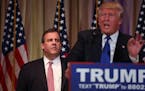 Gov. Chris Christie of New Jersey stands by after introducing Donald Trump as "the next president of the United States" in Palm Beach, Fla., March 1, 