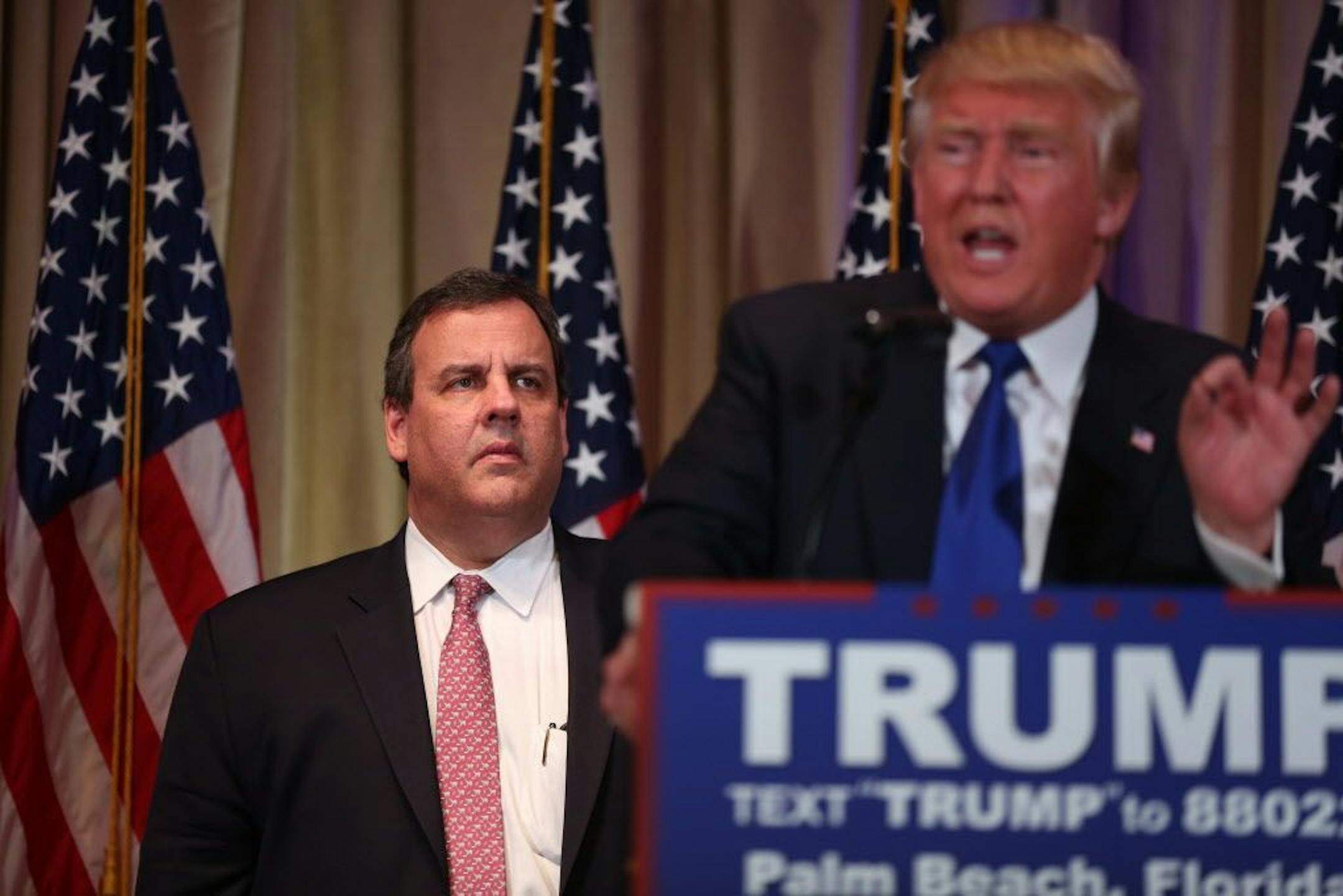 Gov. Chris Christie of New Jersey stands by after introducing Donald Trump as "the next president of the United States" in Palm Beach, Fla., March 1, 2016.