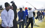 Golfers take shots at the driving range prior to tee time at Pioneer Creek Golf Course in Maple Plain on Wednesday, December 9, 2015. ] (Leila Navidi/