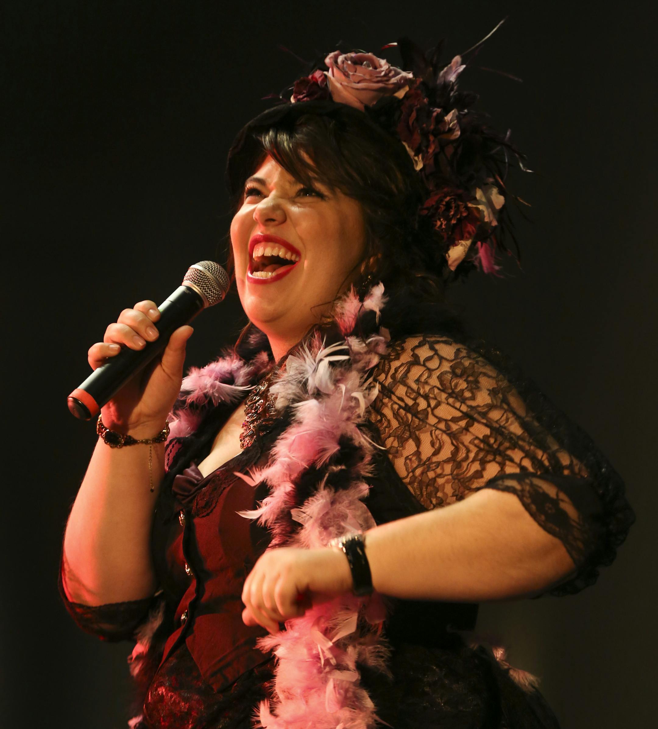 Amy Hopkins performed as she competed during the 2014 Klondike Kate competition in Oakdale, Minn., on Wednesday, January 8, 2014. During the contest six contestants performed up to three songs and were judged on their singing abilities, song choice, costumes, crowd appeal, and their portrayal of the real-life character of Klondike Kate, a woman who struck it rich in the Gold Rush of 1898 as the most famous dance hall girl in the north and has since become a symbol of fun, frivolity and good fell