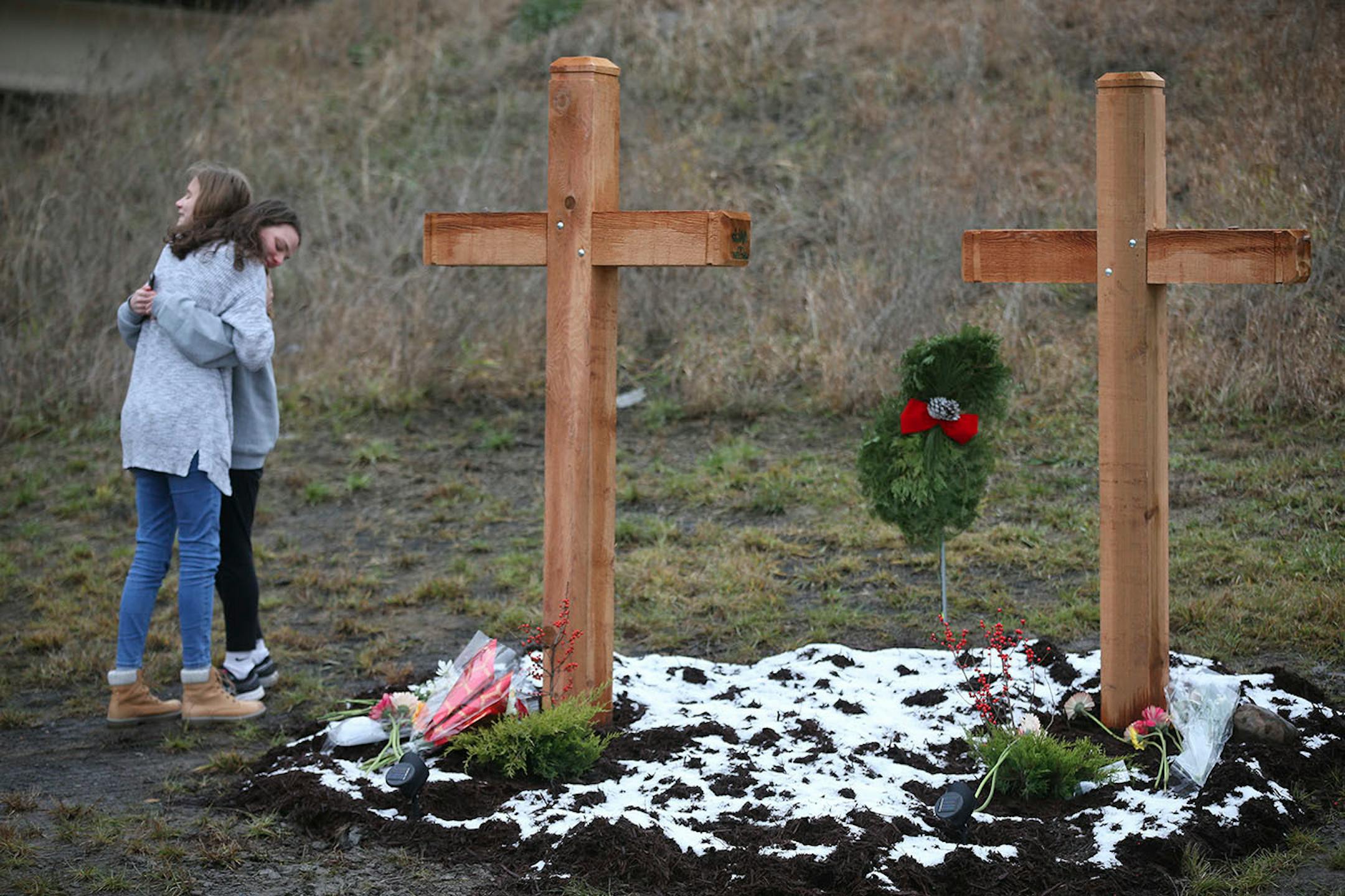 Students from Mounds View High school gathered at the crash scene along Hwy. 96 where they left memorials for two students who were killed in a crash December 05, 2016.
