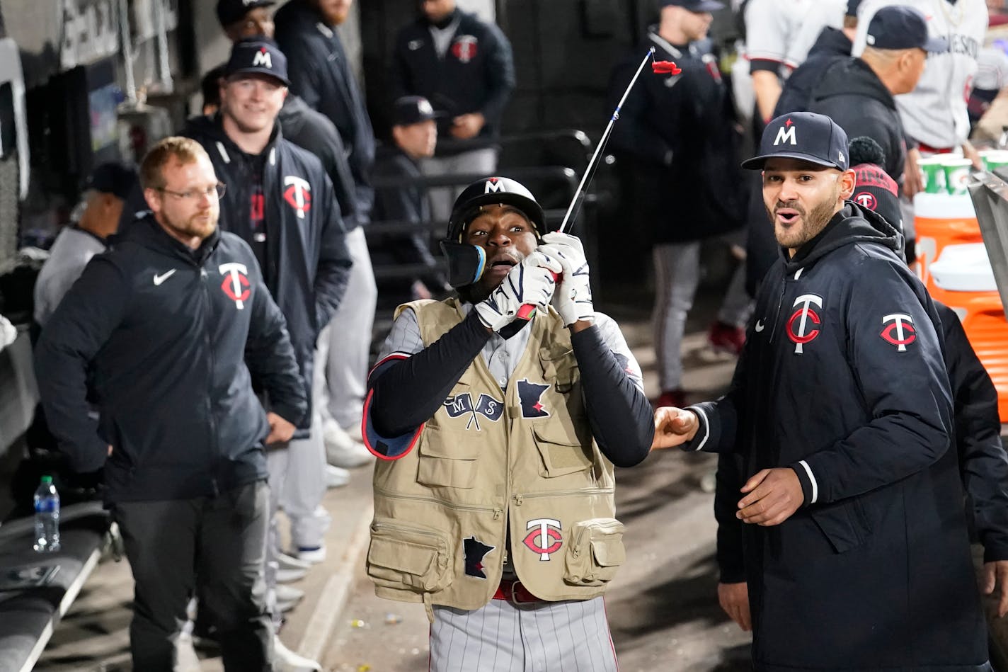 Minnesota Twins' Nick Gordon celebrates his home run in the dugout during the eighth inning of a baseball game against the Chicago White Sox on Tuesday, May 2, 2023, in Chicago. (AP Photo/Charles Rex Arbogast)