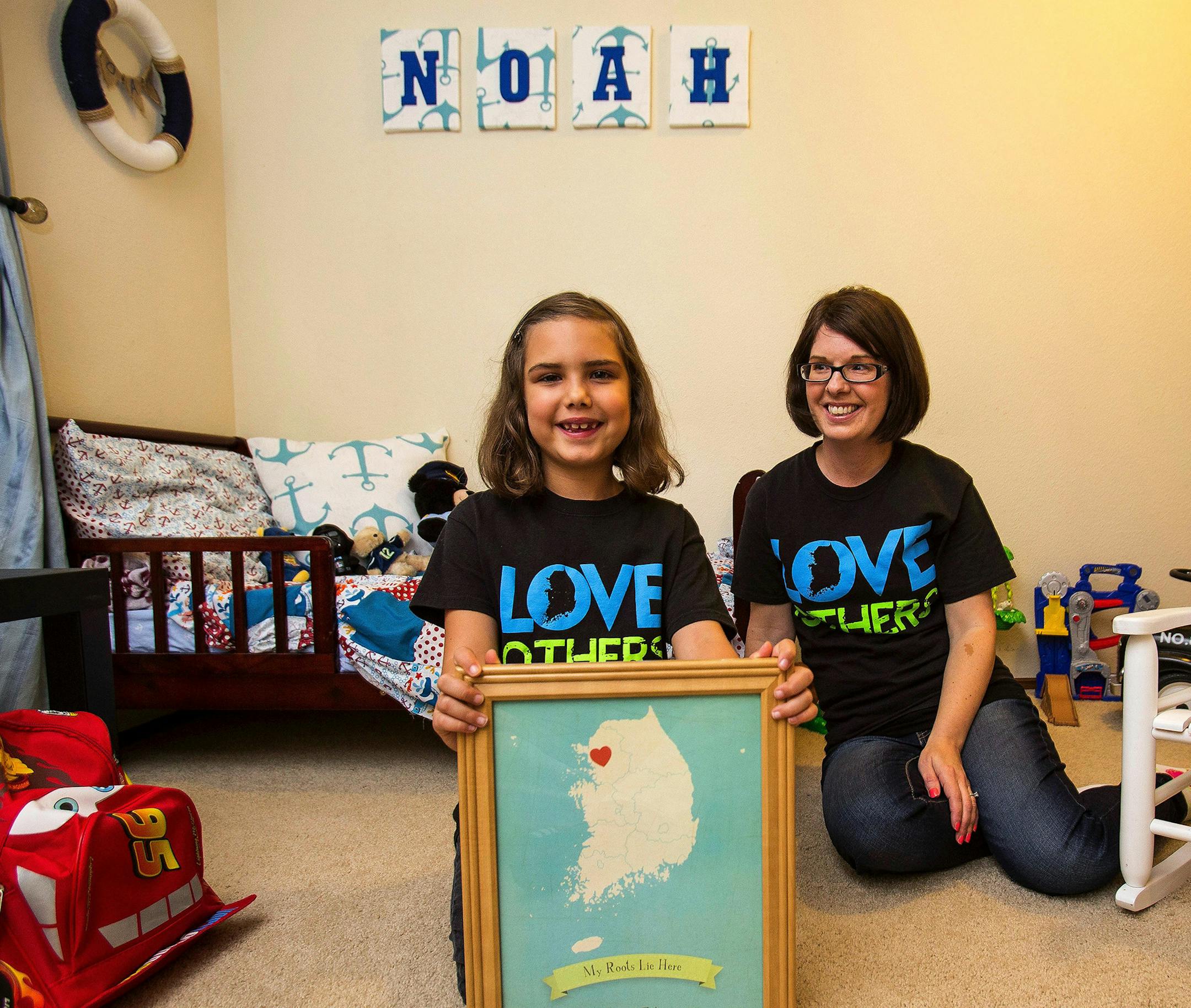 Leah Masseth and daughter Faith, along with father Kevin, not pictured, are awaiting the arrival of Noah. (Dean Rutz/Seattle Times/MCT)