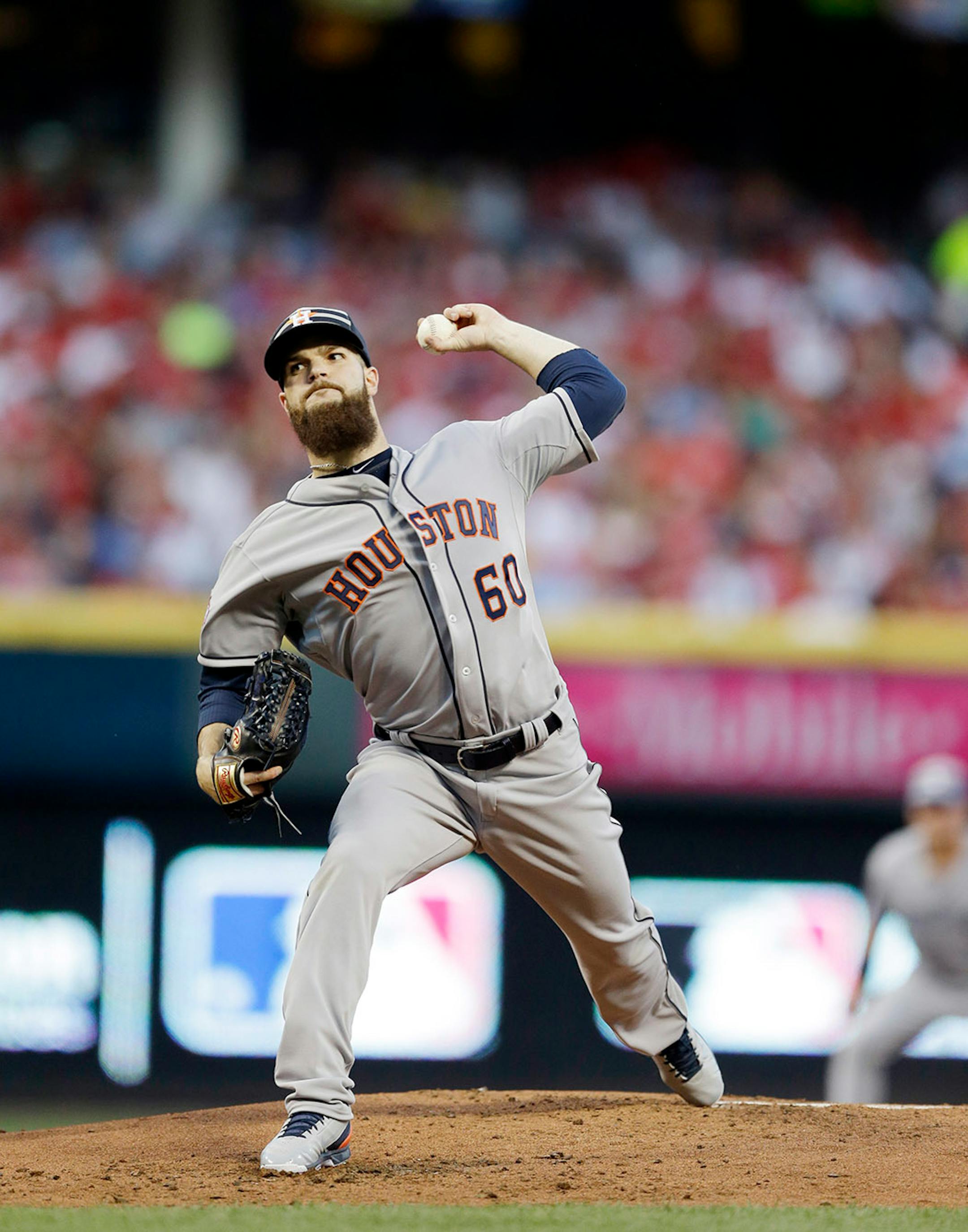 American League's Dallas Keuchel, of the Houston Astros, throws during the first inning of the MLB All-Star baseball game, Tuesday, July 14, 2015, in Cincinnati.