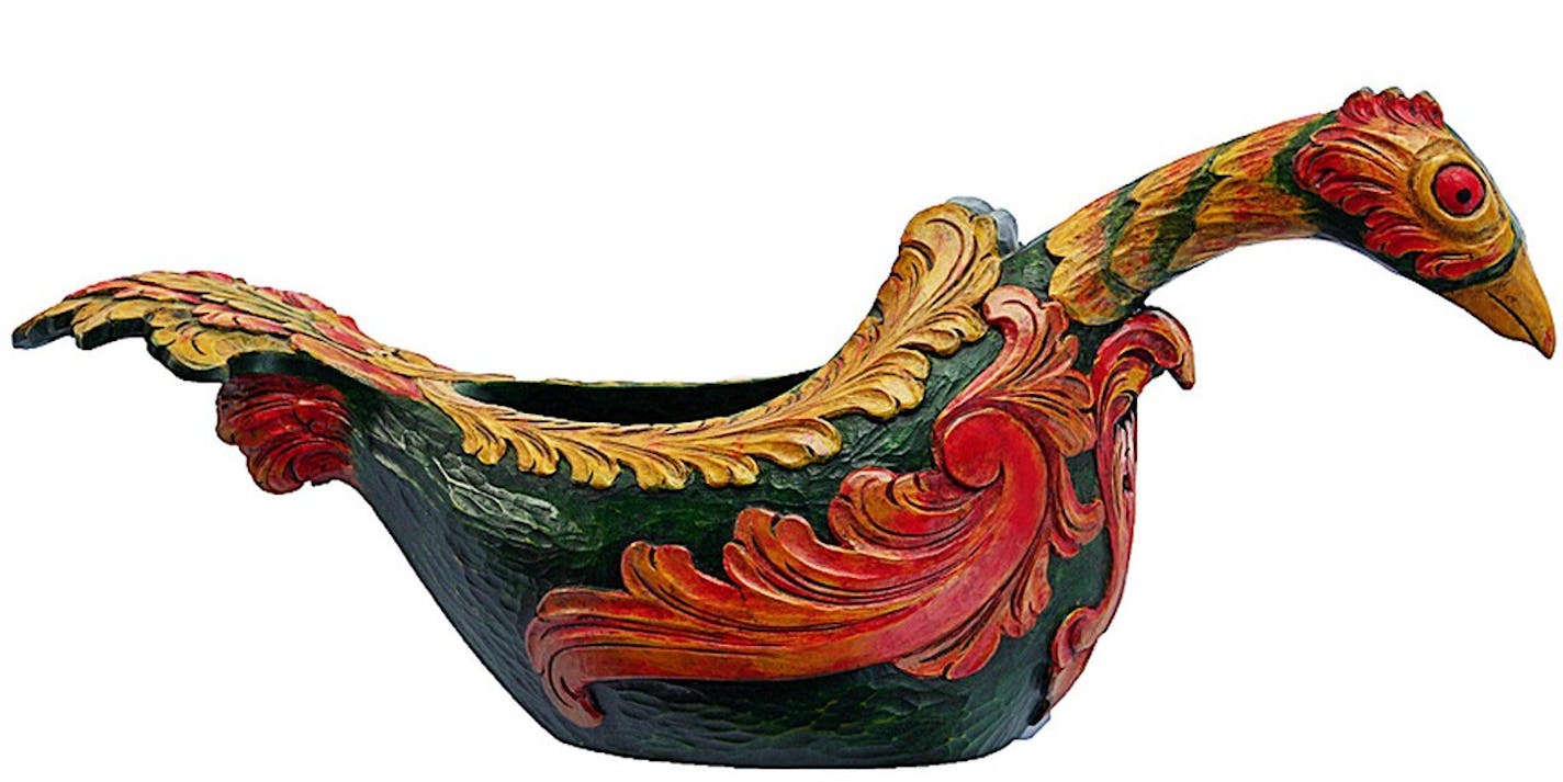 A rooster-shaped ale bowl.