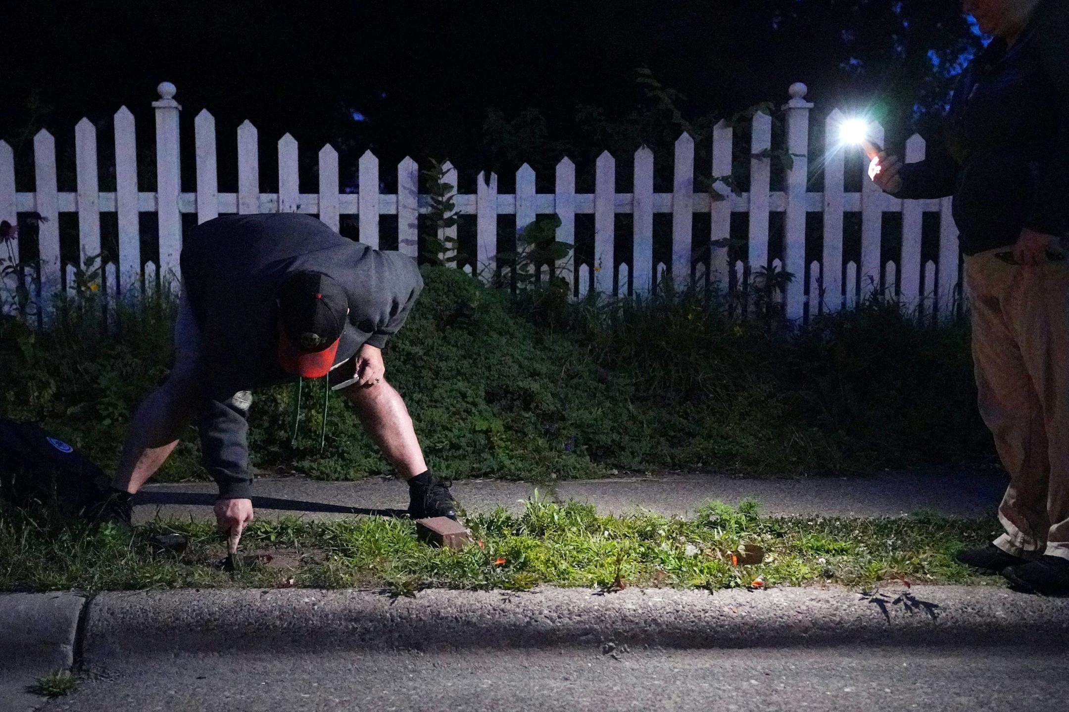 Pat Moriarty, creator of a series of YouTube puzzle videos, hid a miniature treasure chest, the object of his latest puzzle video treasure hunt, as his wife Ang filmed him for a YouTube video in the early morning hours.