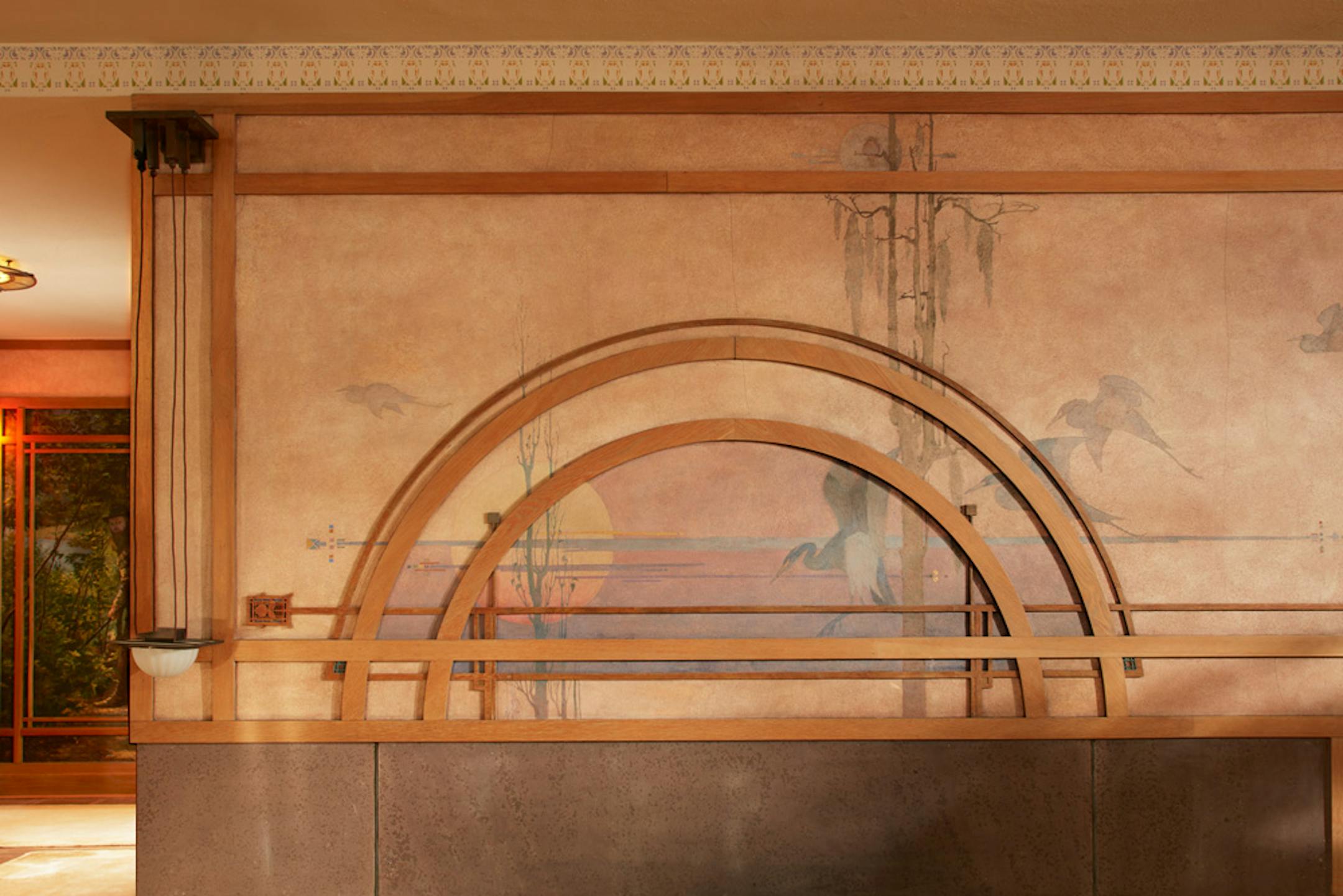 Purcell-Cutts House, 2328 Lake Place, Minneapolis, Minnesota, 1913, William Gray Purcell, Architect.George Elmslie, George Feick Jr. partners in firm Purcell, Feick and Elmslie, Edna S. Purcell House, Prarie School Style, Open floor plan, Art Glass windows, Writing Nook, Fireplace wall Mural by Charles Livingston Bull, Louisana Herons Flying with two Moons, Iridescent glass mortered in frieplace base, Stencil pattern, Peak a Book stained glass entry, Grandfather Gray portrait by Lawton Parker in Entrance Hall, Dining room Art Glass double door to screend-in Porch, Reflecting Pool and landscape designed by Harry Franklin Baker, Living room, Stair Hall, Master Suite, Sleeping Porch, Built in cedar floor storage, fireplace, childrens room connected to master with accordian style operating partition, sunken Living room,tent Ceilings, Ceiling Lights and art glass by Mosaic Art Shops Minneapolis, Maid Call Button, Air conditioning, Central vacuum system, sliding kitchen door operated by foot button, icebox in kitchen with door to outside, custom Sitting chair, Custom Floor lamp, Custom Dining room table,chairs and sideboard, Custom Cluster Pendant lighting, Oak hardwood floors and trim, Custom Throw rugs, Continuous tented roof and ceiling, Elevated dining room, dropped floor living room, "Little Joker", Personalized home with monogram ESP for Edna S. Purcell,