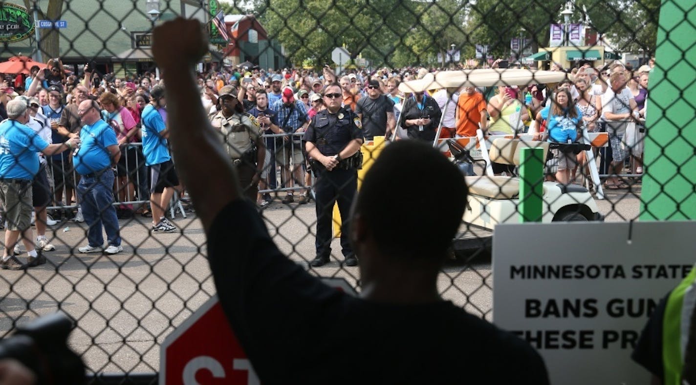 Black Lives Matter marchers protested Saturday outside the main gate of the Minnesota State Fair.