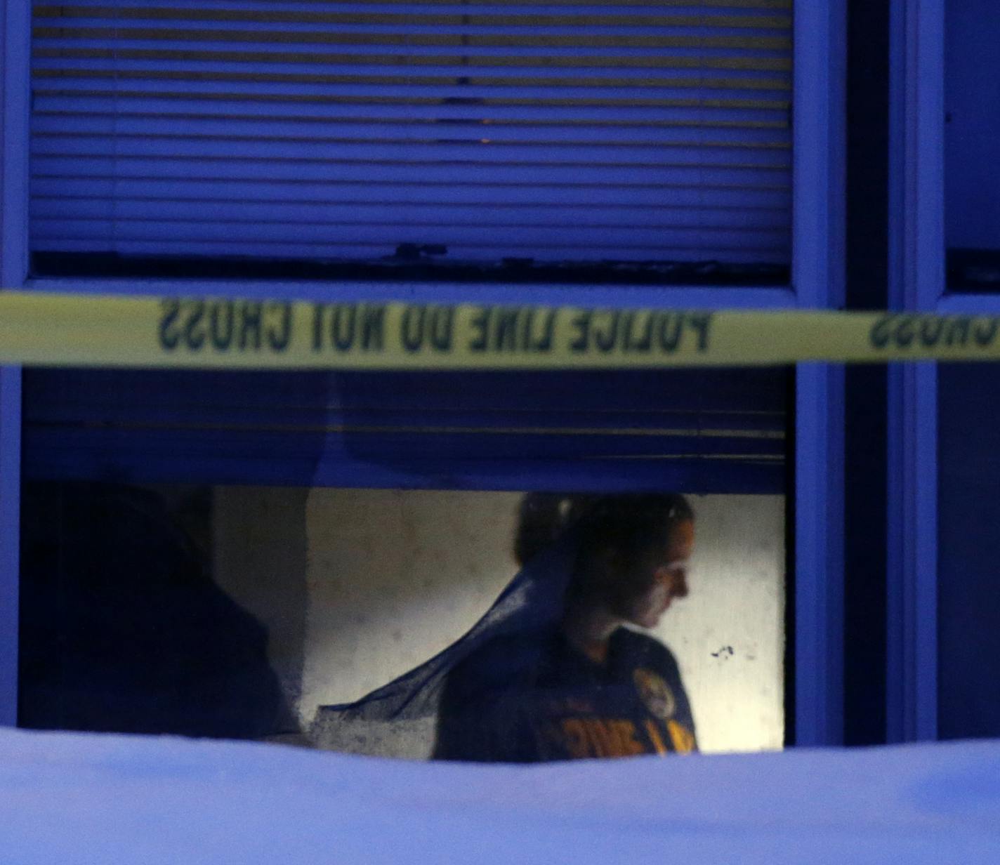 In the Frogtown neighborhood of St. Paul, police including members of the crime lab investigated the scene of a triple homicide at an apartment on Victoria Ave.]rtsong-taatarii@startribune.com