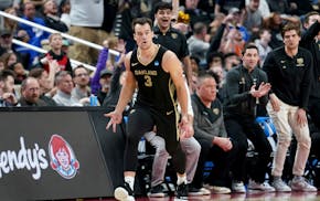 Oakland's Jack Gohlke celebrates after hitting one of his 10 three-pointers to spark No. 14 seed Oakland past No. 3 Kentucky 80-76 in the first round