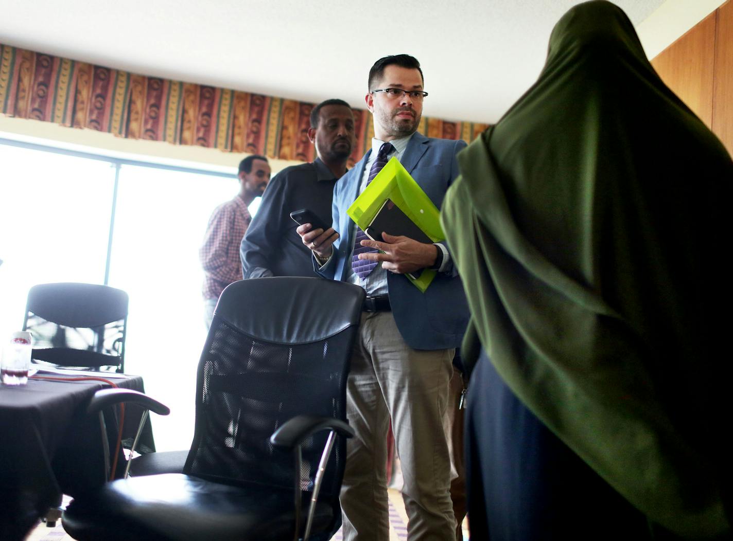 Javier Morillo, a former academic turned union organizer, met with airport workers at the Embassy Suites near MSP to talk about organizing/striking before sitting down at the negotiating table with their employer on Aug. 17.