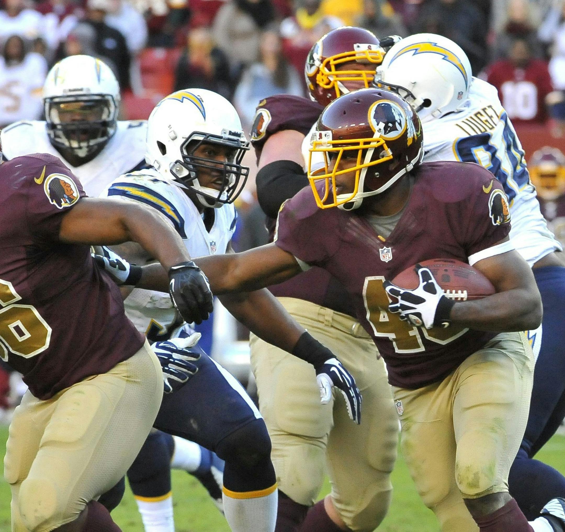 Washington Redskins fullback Darrel Young (36) leads the way for Redskins running back Alfred Morris (46) in the overtime period against the San Diego Chargers at FedEx Field in Landover, Maryland, Sunday, November 3, 2013. Young scored the game-winning touchdown, giving the Redskins a 30-24 victory. (Mark Gail/MCT)