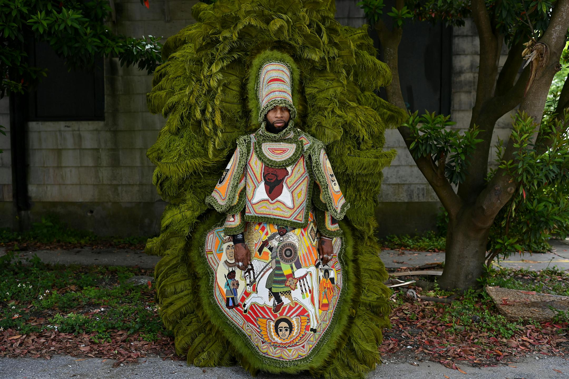Demond Melancon, big chief of the Young Seminole Hunters, poses in his "Jah Defender" suit on April 26 in New Orleans. MUST CREDIT: Washington Post photo by Joshua Lott