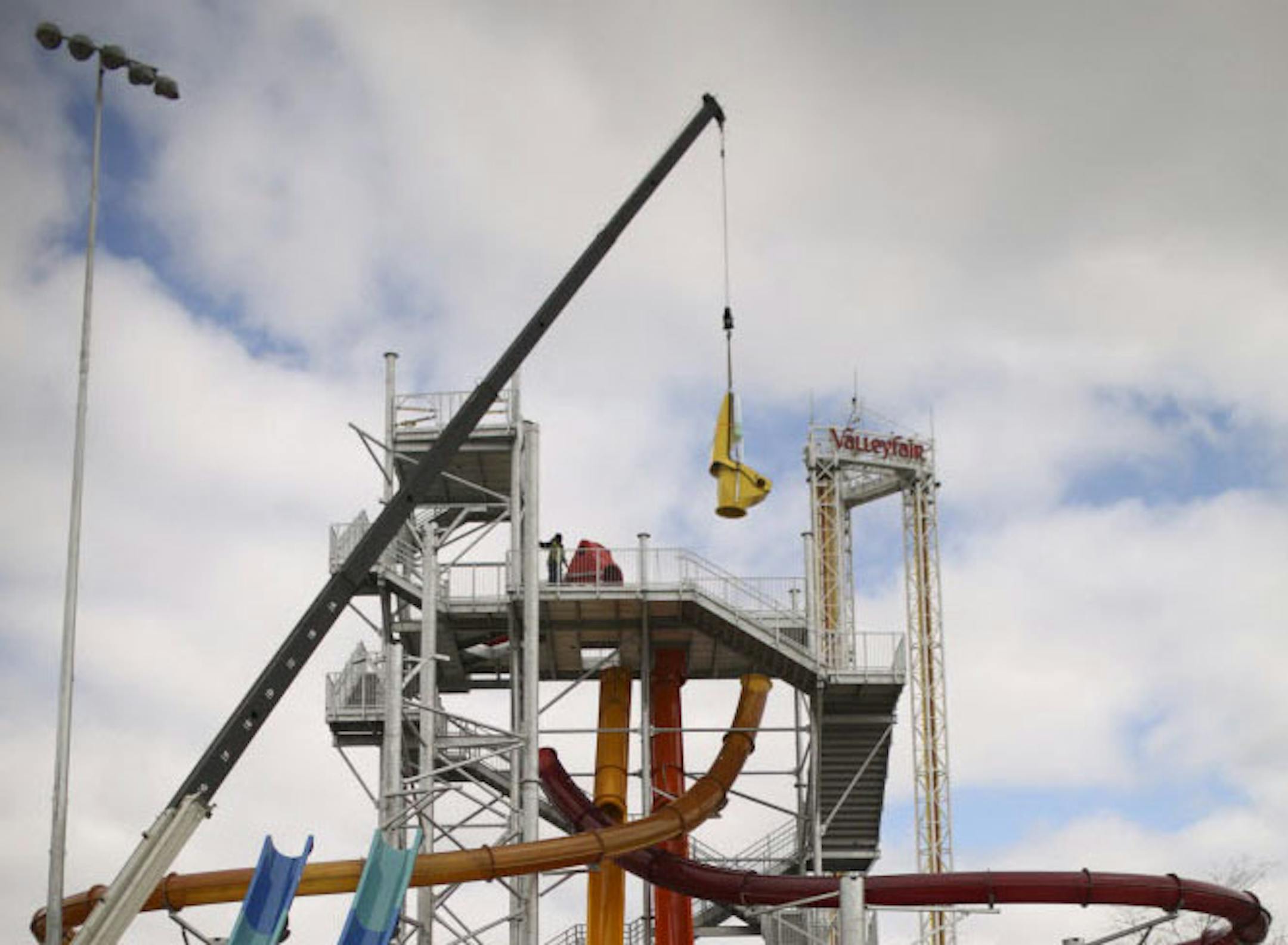 A crane readied a component of the Breakers Plunge tower for installation Thursday afternoon at Valleyfair.