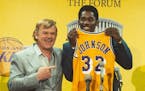 Lakers owner Jerry Buss (John C. Reilly) introduces a young Magic Johnson (Quincy Isaiah) in HBO’s “Winning Time.”