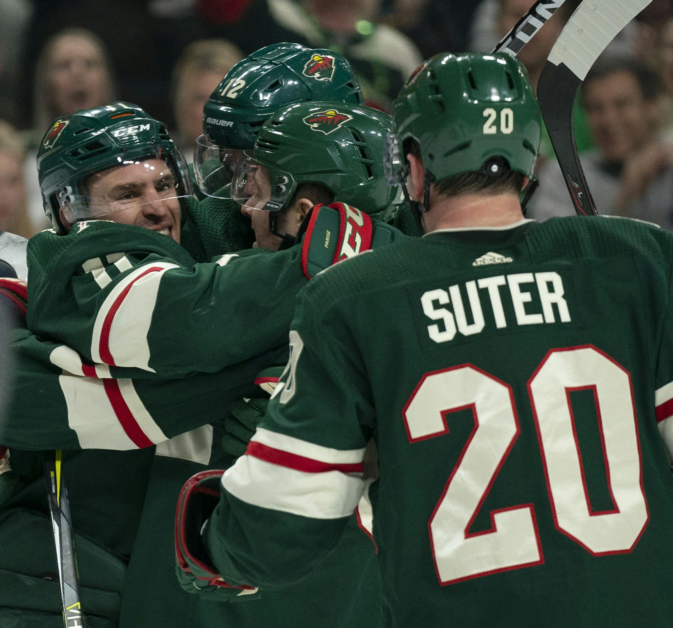 Minnesota Wild left wing Zach Parise (11) was congratulated by his line mates after his second period goal tied the game 1-1. ] JEFF WHEELER • jeff.wheeler@startribune.com The Minnesota Wild faced the New York Islanders in an NHL hockey game Sunday evening, March 17, 2019 at Xcel Energy Center in St. Paul.
