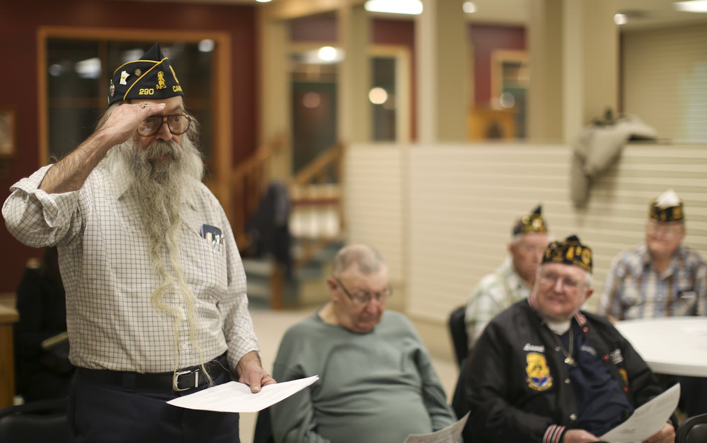 In small cities across the state, American Legion and VFW posts are selling the big buildings they put up back when World War II veterans were joining in droves. Now, outstate posts need to save on expenses in a time of falling membership. The Cambridge American Legion Post sold their building downtown earlier this year. Tuesday night, December 10, 2013, the members of Post 290 held their first meeting in their new, rented storefront. Jim Johnson, a Vietnam era veteran, saluted after he spoke fr