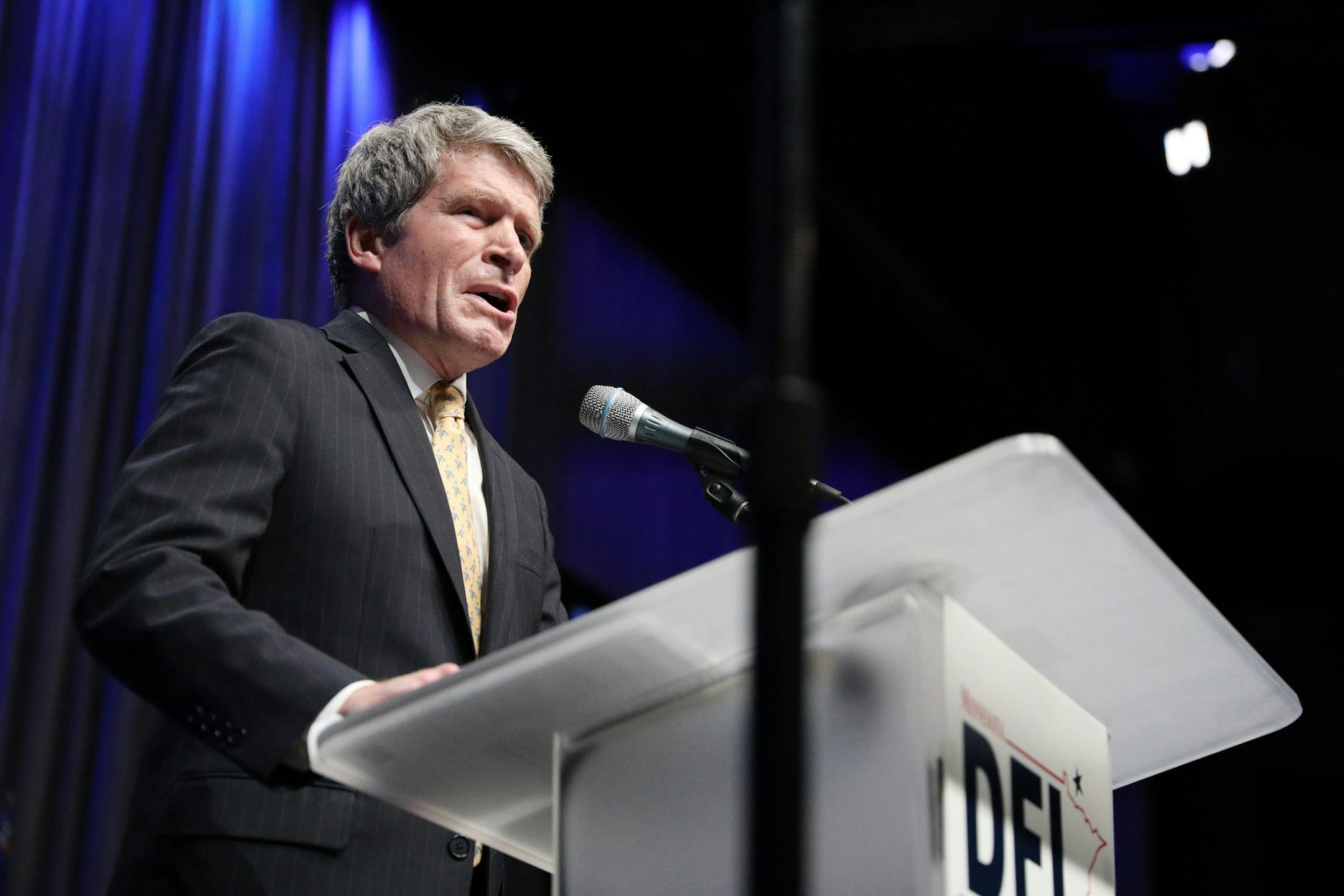 U.S. Senate candidate Richard Painter spoke from the stage during the DFL State Convention Friday.