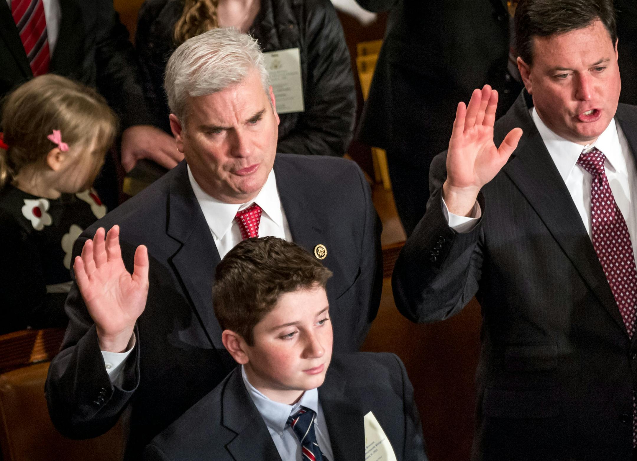 Rep. Tom Emmer, R - Minn. 6th, left, accompanied by his son, Billy, 15, is sworn in by Speaker of the House, John Boehner, R-Ohio, on the floor of The House of Representatives on Capitol Hill in Washington, D.C., on Tuesday, January 6, 2015. Emmer defeated Democrat Joe Perske and independent candidate John Denney in a November 2014 election for the House of Representatives seat vacated by Michele Bachmann. ( Photo / J.M. Eddins Jr. for the Minneapolis Star-Tribune)