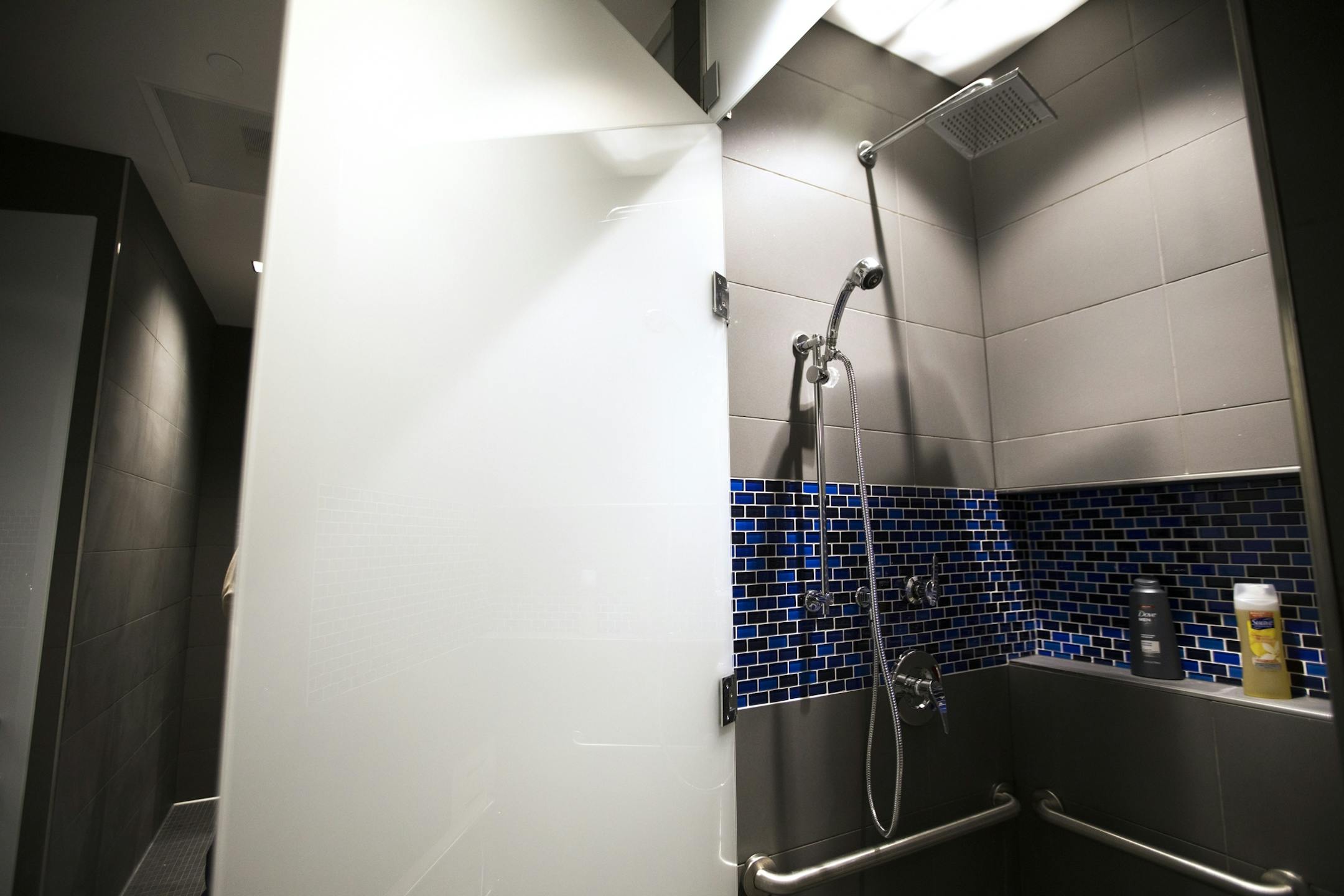 The showers are set to a height of eight feet inside the Timberwolves locker room.
