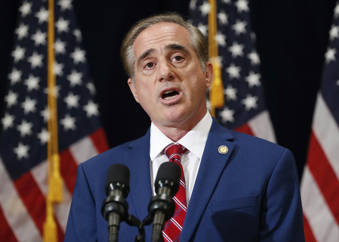 FILE - In this Aug. 16, 2017, file photo, Veterans Affairs Secretary David Shulkin speaks in Bridgewater, N.J. In a fresh warning, Shulkin says there could potentially be delays in providing medical care to tens of thousands of veterans if lawmakers don&#xed;t act soon to approve billions in emergency funding for the ailing private-sector Choice program. (AP Photo/Pablo Martinez Monsivais, File)