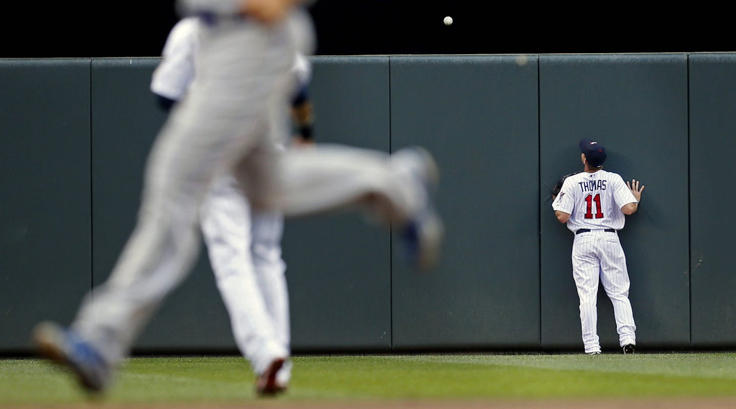 Twins center fielder Clete Thomas watches a Royals' Billy Butler three-run home run go over the fence off Minnesota Twins pitcher P.J. Walters in the first inning. ] BRIAN PETERSON &#x201a;&#xc4;&#xa2; brianp@startribune.com Minneapolis, MN - 06/28/2013