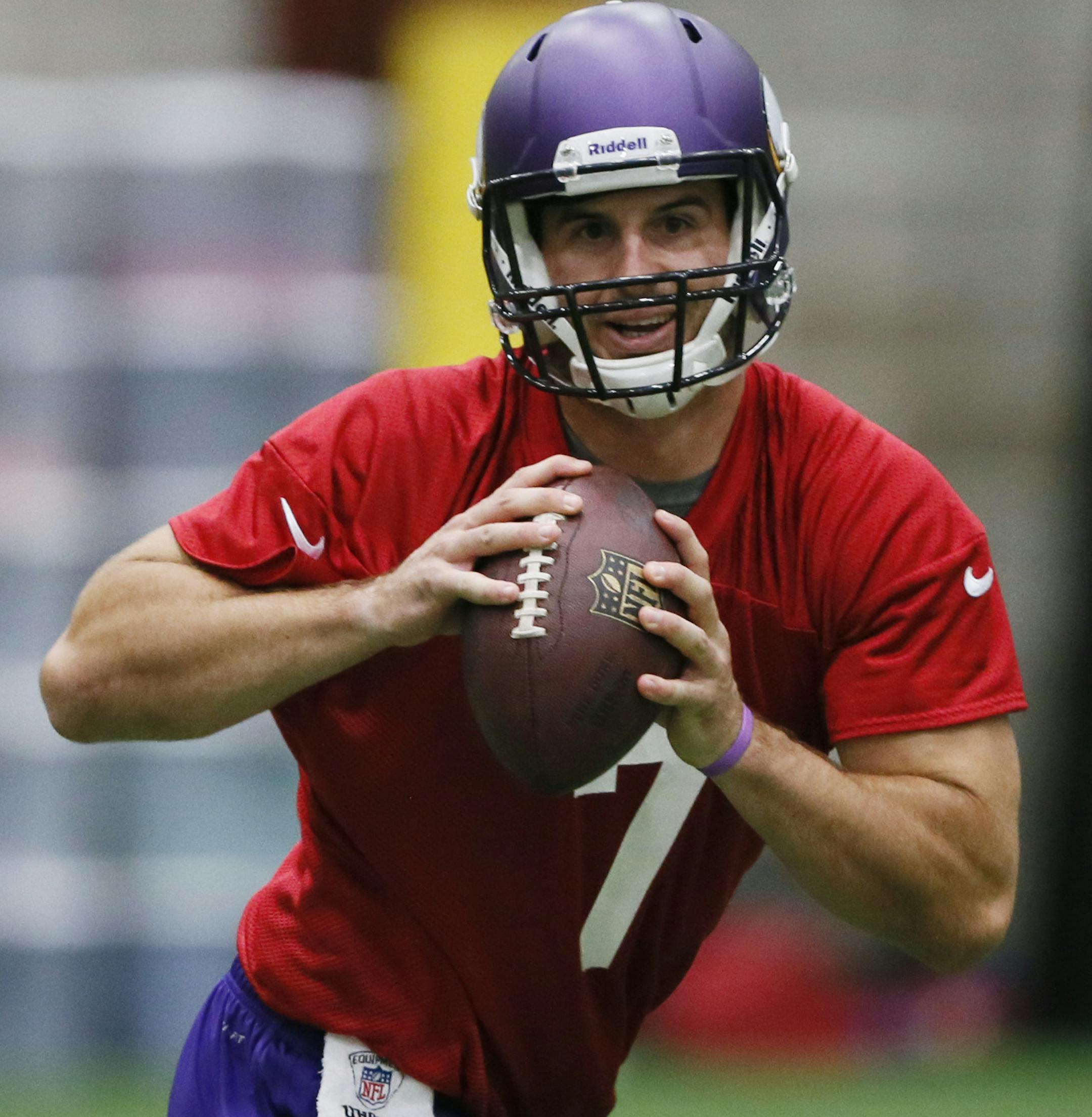 Quarterback Christian Ponder rolls out for a pass during Minnesota Vikings OTA practice Wednesday June, 5 2013 in Eden Prairie, MN. ] JERRY HOLT ‚Ä¢ jerry.holt@startribune.com
