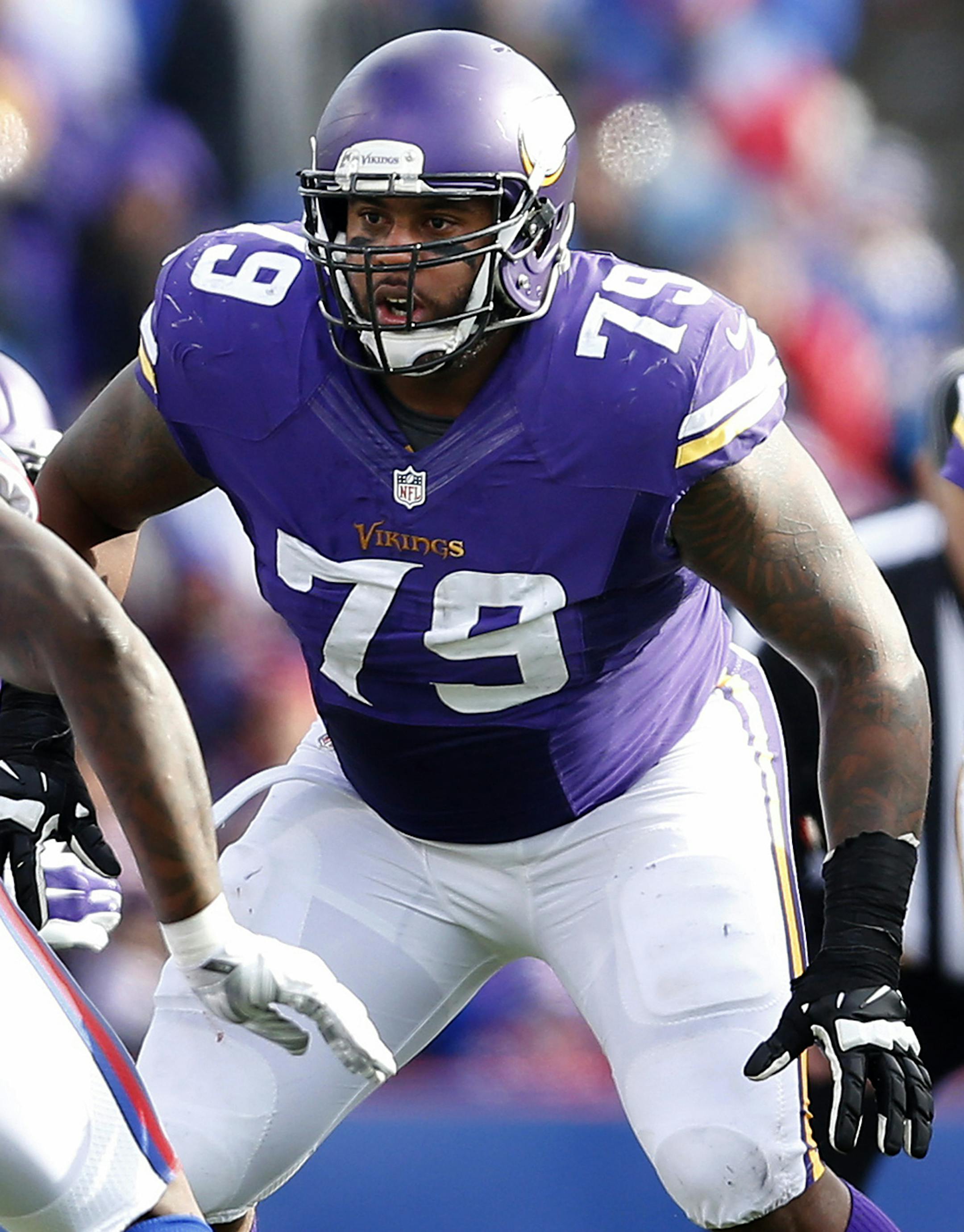 Minnesota Vikings offensive lineman Mike Harris (79) and center Joe Berger (61) play during the third quarter of their game against the Buffalo Bills on Sunday, Oct. 19, 2014, at Ralph Wilson Stadium in Orchard Park, N.Y. (Carlos Gonzalez/Minneapolis Star Tribune/MCT) ORG XMIT: 1158870