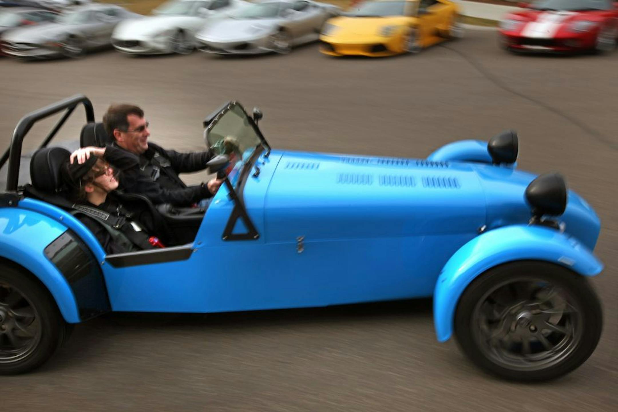 Rich Wagner put an ad on Craigslist seeking someone to give Maddy her wish of riding in a sports car. Bruno Silikowski read the ad and put out a call to his friends for help. On Friday, 13 cars lined up to fulfill her wish at Auto MotorPlex in Chanhassen. Drew Richardson took Maddy for a ride in his Caterham.
