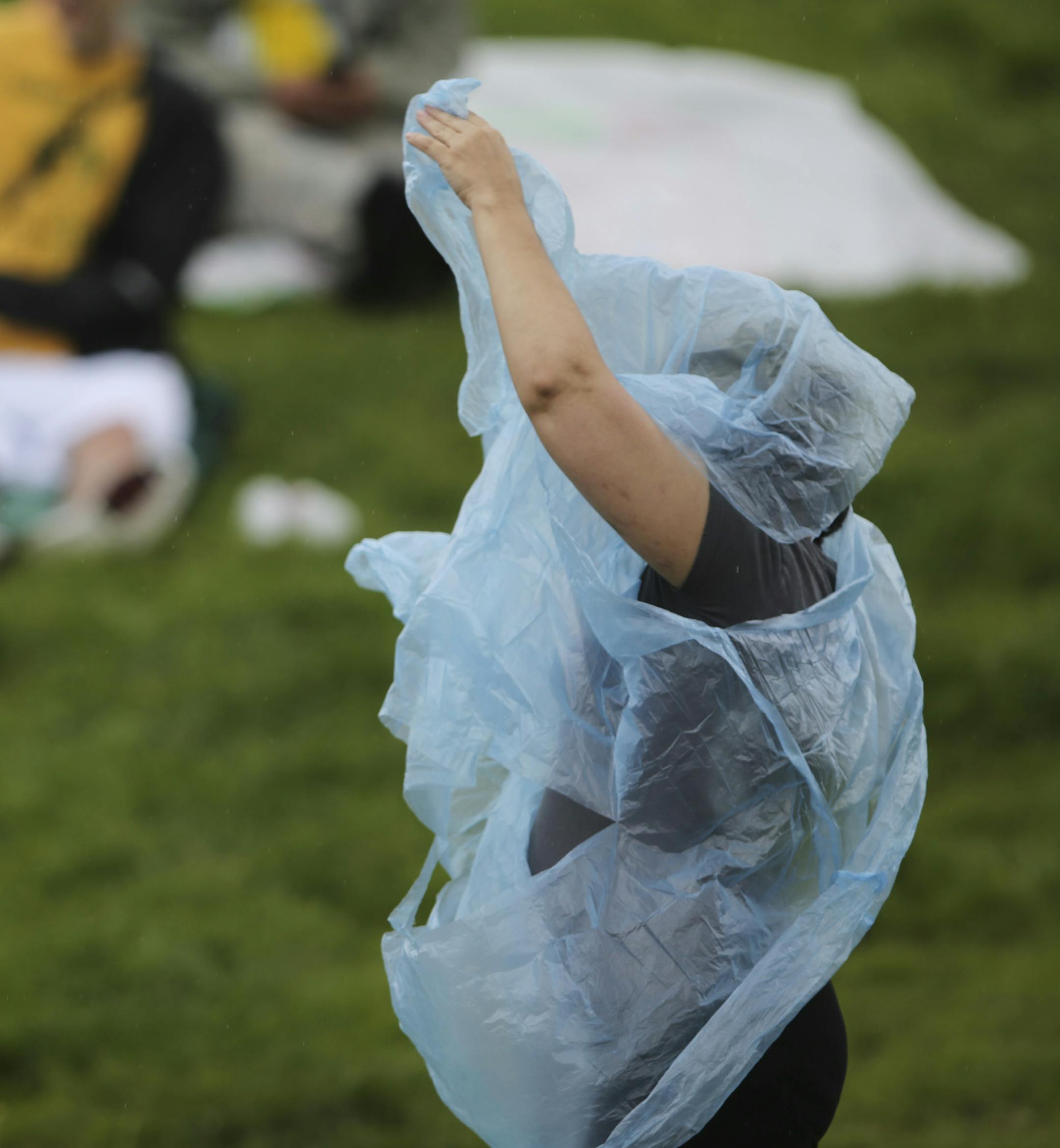 Fans got preparted as a light rain began to fall shortly after the gates opened for Rock the Garden Sunday afternoon. ] JEFF WHEELER ‚Ä¢ jeff.wheeler@startribune.com The 14th annual Rock the Garden music event continued Sunday afternoon, June 22, 2104 on the grounds of the Walker Art Center in Minneapolis.