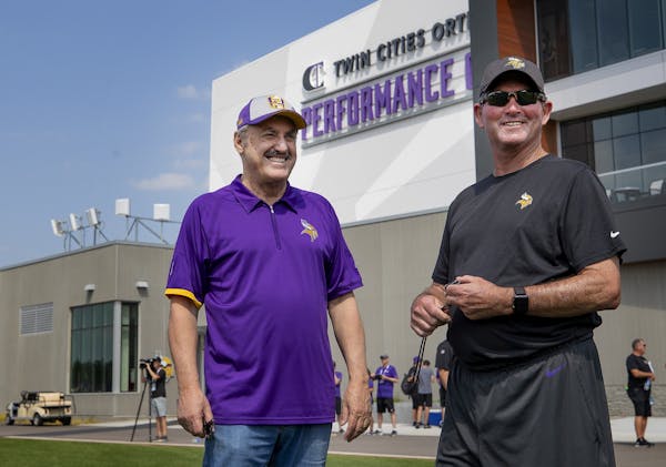 Minnesota Vikings owner Zygi Wilf and head coach Mike Zimmer at Wednesday's practice.