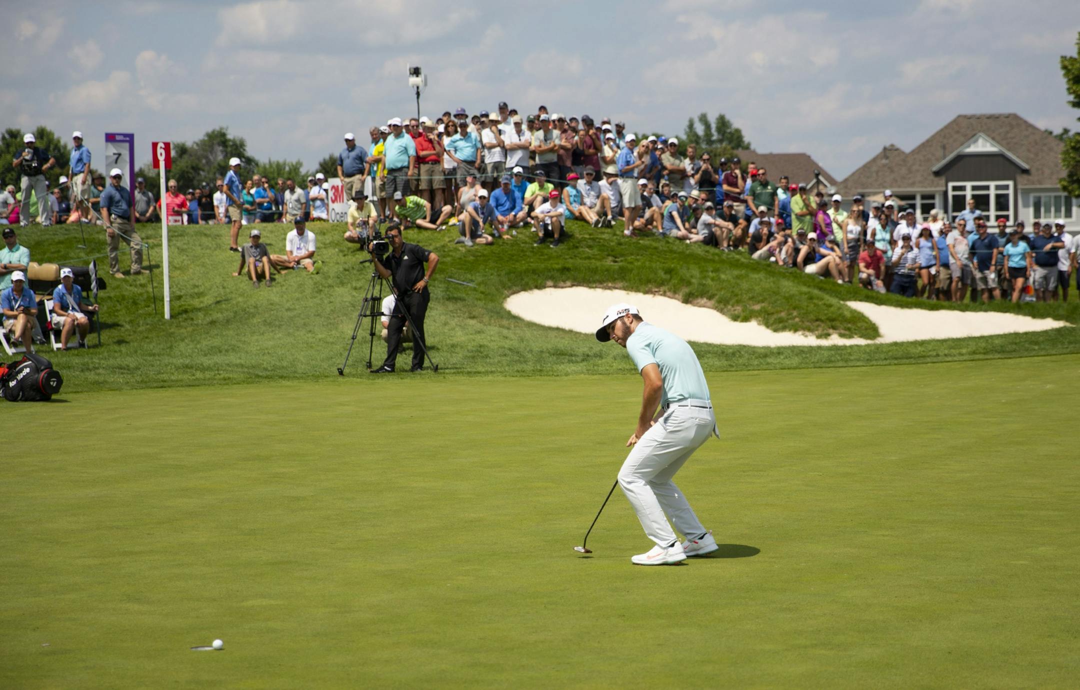 Matthew Wolff reacts after barely missing a birdie putt on the sixth hole.