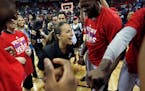 San Antonio Spurs Summer League coach Becky Hammon celebrated with her team after it defeated the Phoenix Suns in an NBA Summer League championship ga