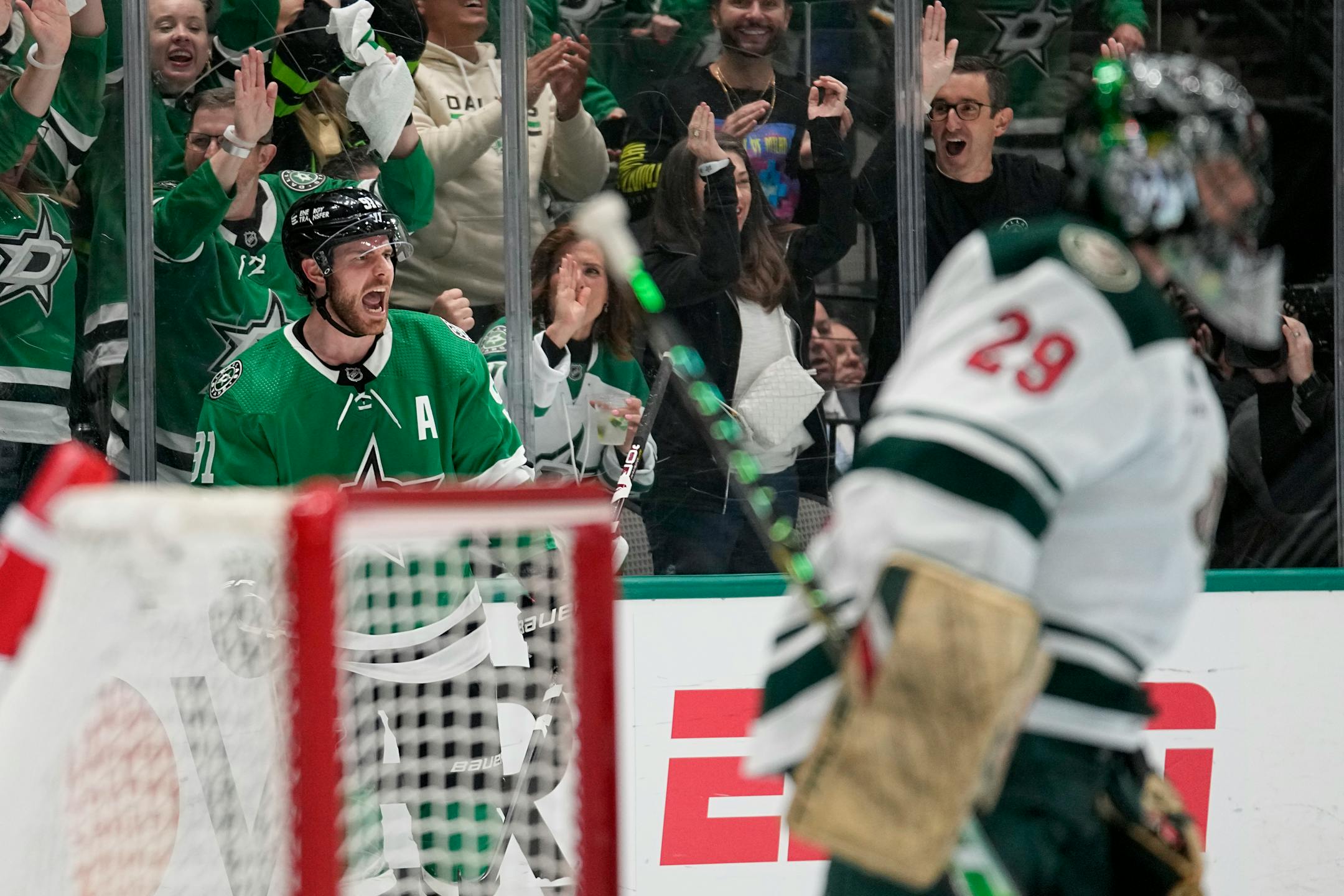 Dallas Stars center Tyler Seguin, left, celebrates after scoring against Minnesota Wild goaltender Marc-Andre Fleury (29) in the first period of Game 2.