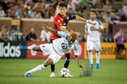 Minnesota United&#xd5;s Kevin Molino and Atlas&#xd5; Javier Salas fight for the ball during the second half on Saturday, July 15, 2017, at TCF Bank St