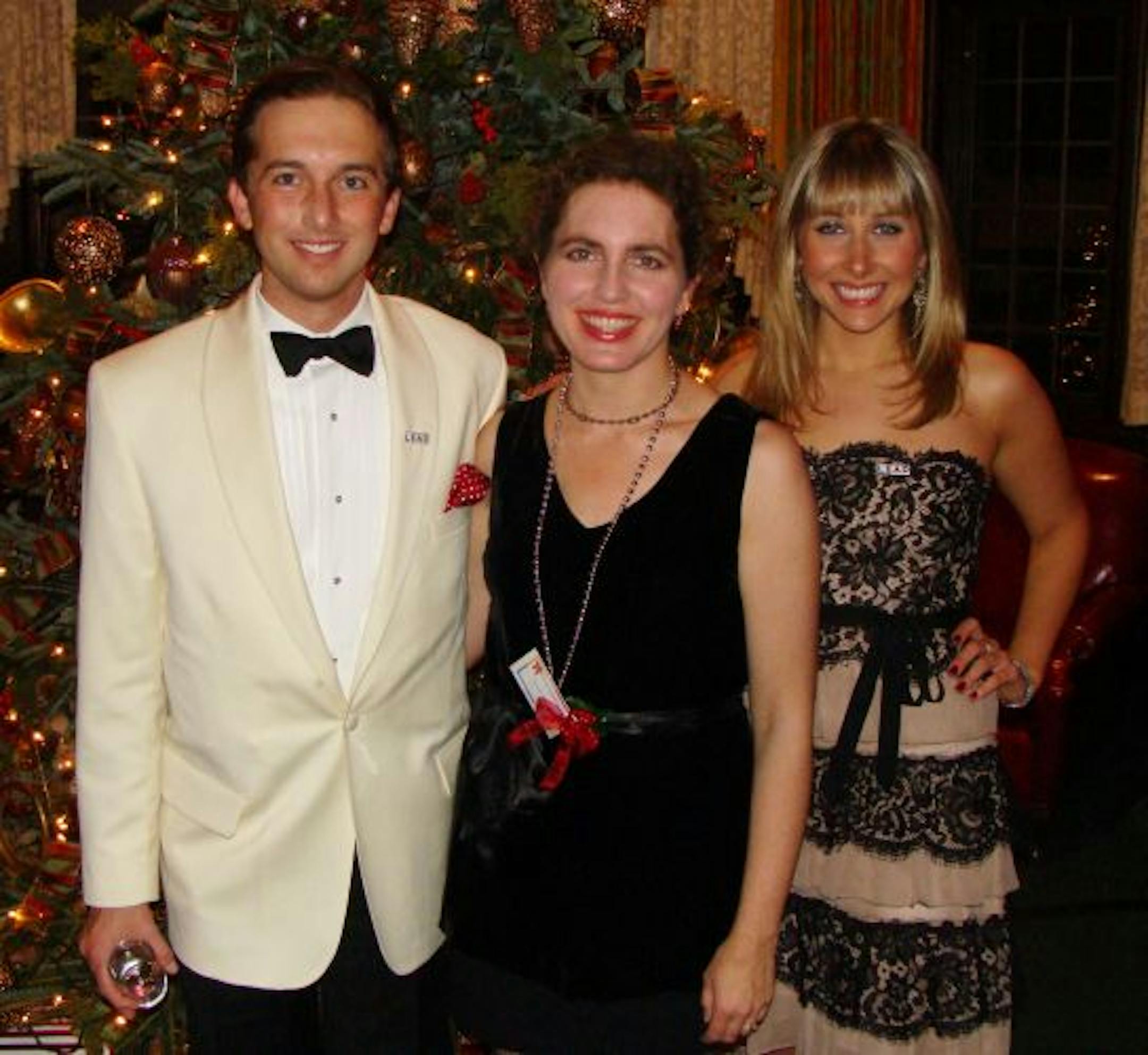 Sara Glassman, sglassman@startribune.com The LEAD Project's Holiday ball at the Minneapolis Club. Sarah Wovcha, executive director of Children�s Dental Services (middle) with incoming board members Jon Applebaum and Bridget Ulrich.