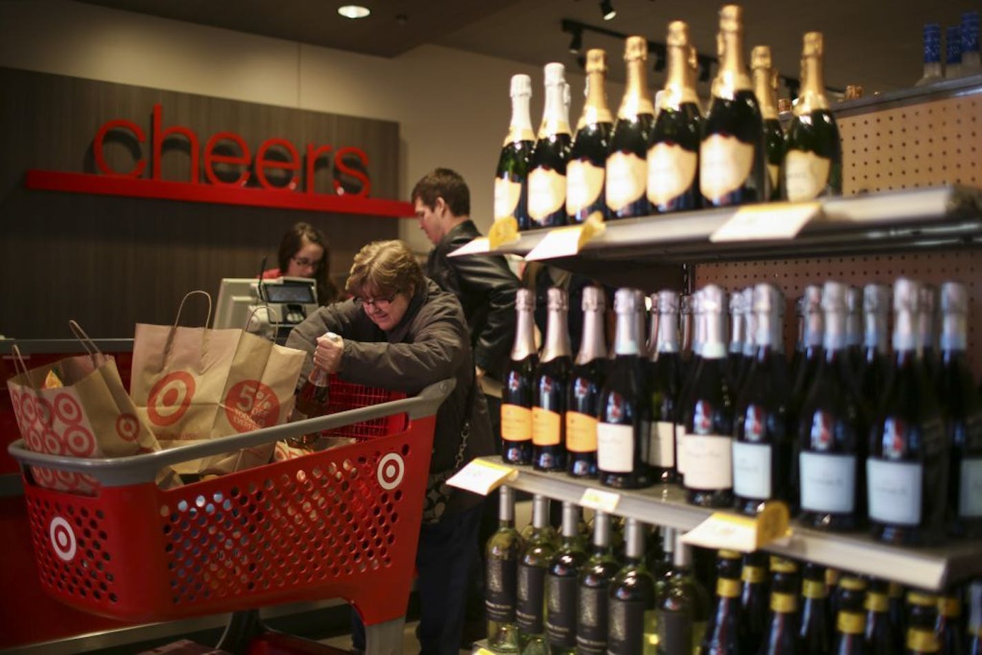 After shopping in the Otsego Super Target Wednesday afternoon, Geralynn Rhoades of Princeton stepped into the liquor store to pick up some champagne to celebrate the new year.