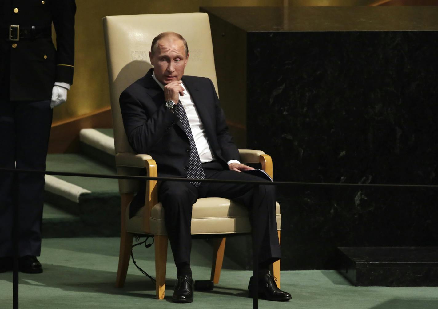 Russia's Vladimir Putin waits to begin his address to the 70th session of the United Nations General Assembly, Monday, Sept. 28, 2015. (AP Photo/Richard Drew)