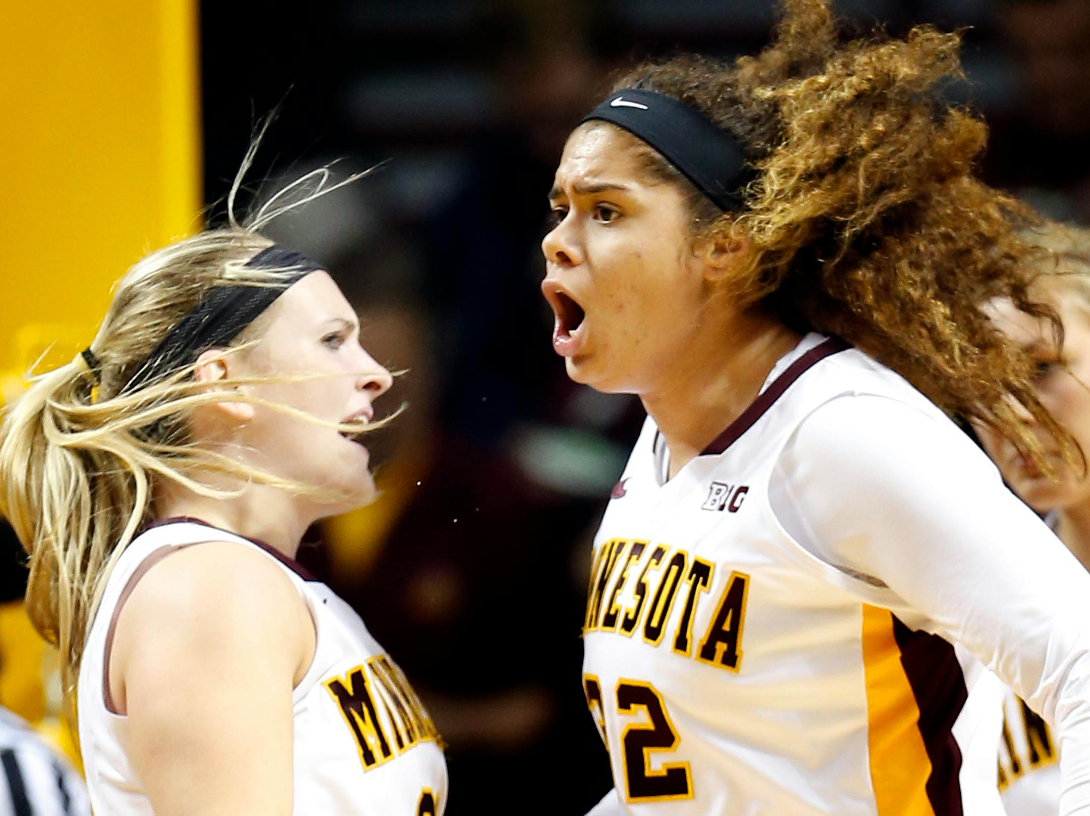 Sari Noga (21) and Amanda Zahui B. celebrated during the Gophers' 90-55 victory ove Charlotte earlier this season.