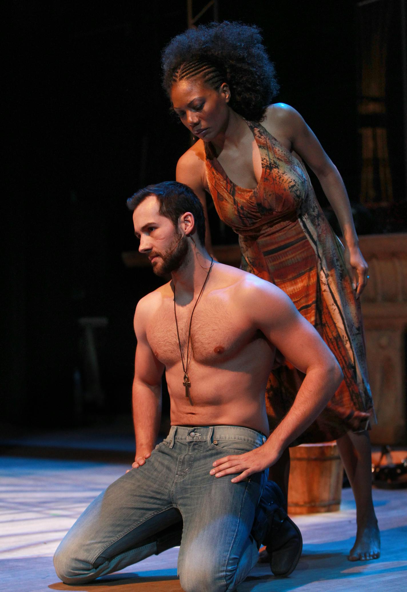 African American slave woman, Austene Van Radames, shirtless officer, Jared Oxborough Amneris. _ The new, original production of "Aida" by Theater Latte Da and the Hennepin Theatre Trust at the Pantages Theatre. Lead are, Austene Van, Radames and Jared Oxborough, Amneris. [ TOM WALLACE &#x201a;&#xc4;&#xa2; twallace@startribune.com _ Assignments #20026850A_December 27, 2012_ SLUG: stag0104_ EXTRA INFORMATION: Aida (main character, African American slave woman): Austene Van Radames (main character