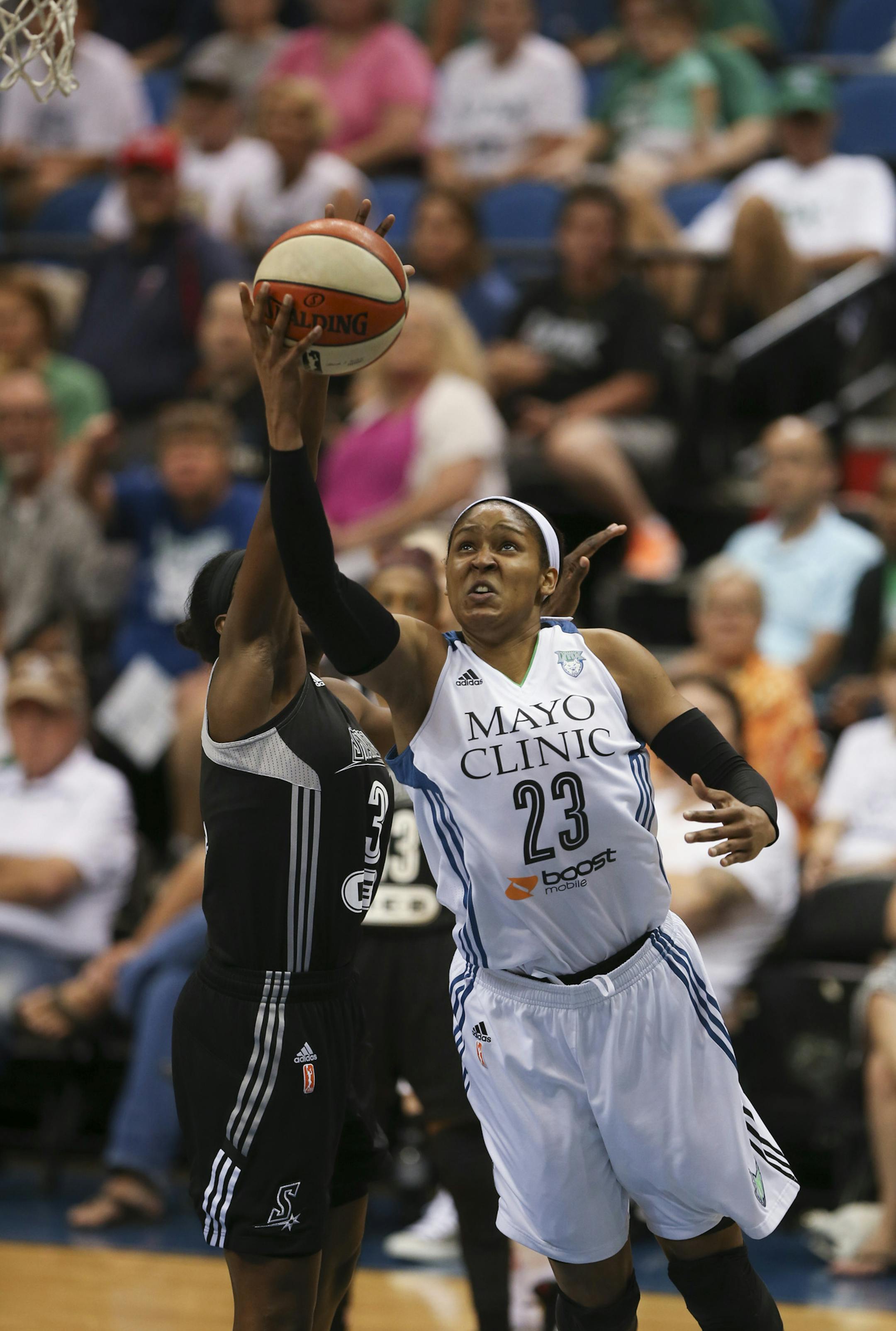 The Lynx' Maya Moore took a first quarter shot Sunday night at Target Center. She led all scorers with 20 points. ] JEFF WHEELER ï jeff.wheeler@startribune.com The Minnesota Lynx met the San Antonio Stars in an WNBA game Sunday night, July 12, 2015 at Target Center in Minneapolis.