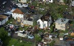 Damage is shown after a tornado hit northern Minneapolis Sunday, May 22, 2011.