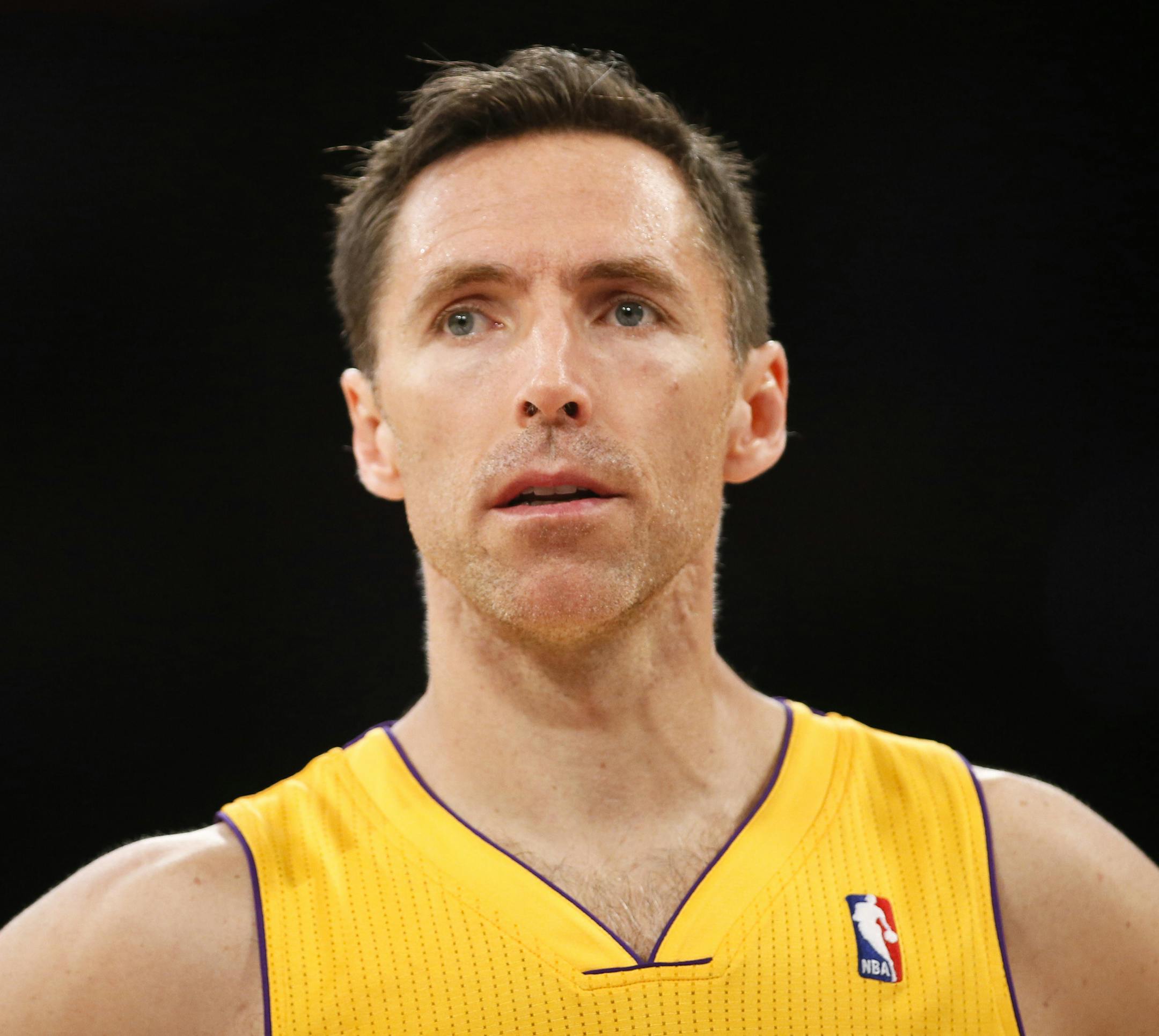 FILE - In this April 1, 2014 file photo, Los Angeles Lakers guard Steve Nash stands on the court against the Portland Trail Blazers during the first half of an NBA basketball game in Los Angeles. Nash announced his retirement Saturday, March 21, 2015 after a 19-year NBA career that included two MVP awards. The 41-year-old Canadian made the announcement Saturday in a letter on The Players’ Tribune, a website where he is a senior producer. Nash played in just 65 games over the last three se
